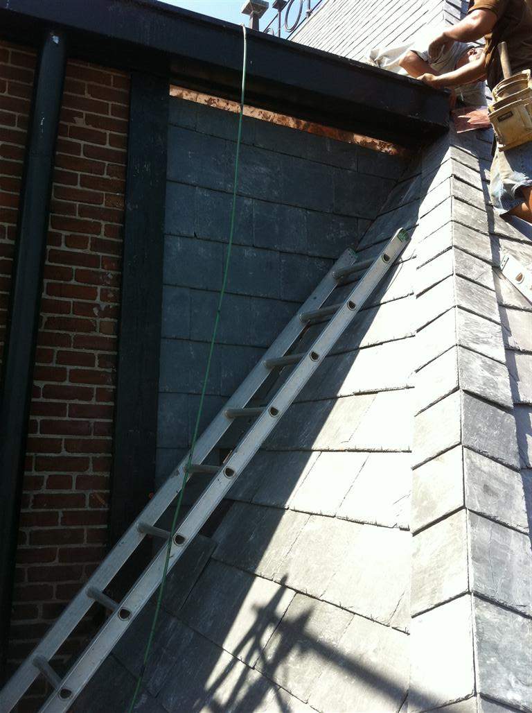 Historic Building ROOF REPLACEMNT with GAF TruSlate  on steep slop and Versico 60mil TPO on flat roof by Gorilla Exteriors Contracting, LLC
