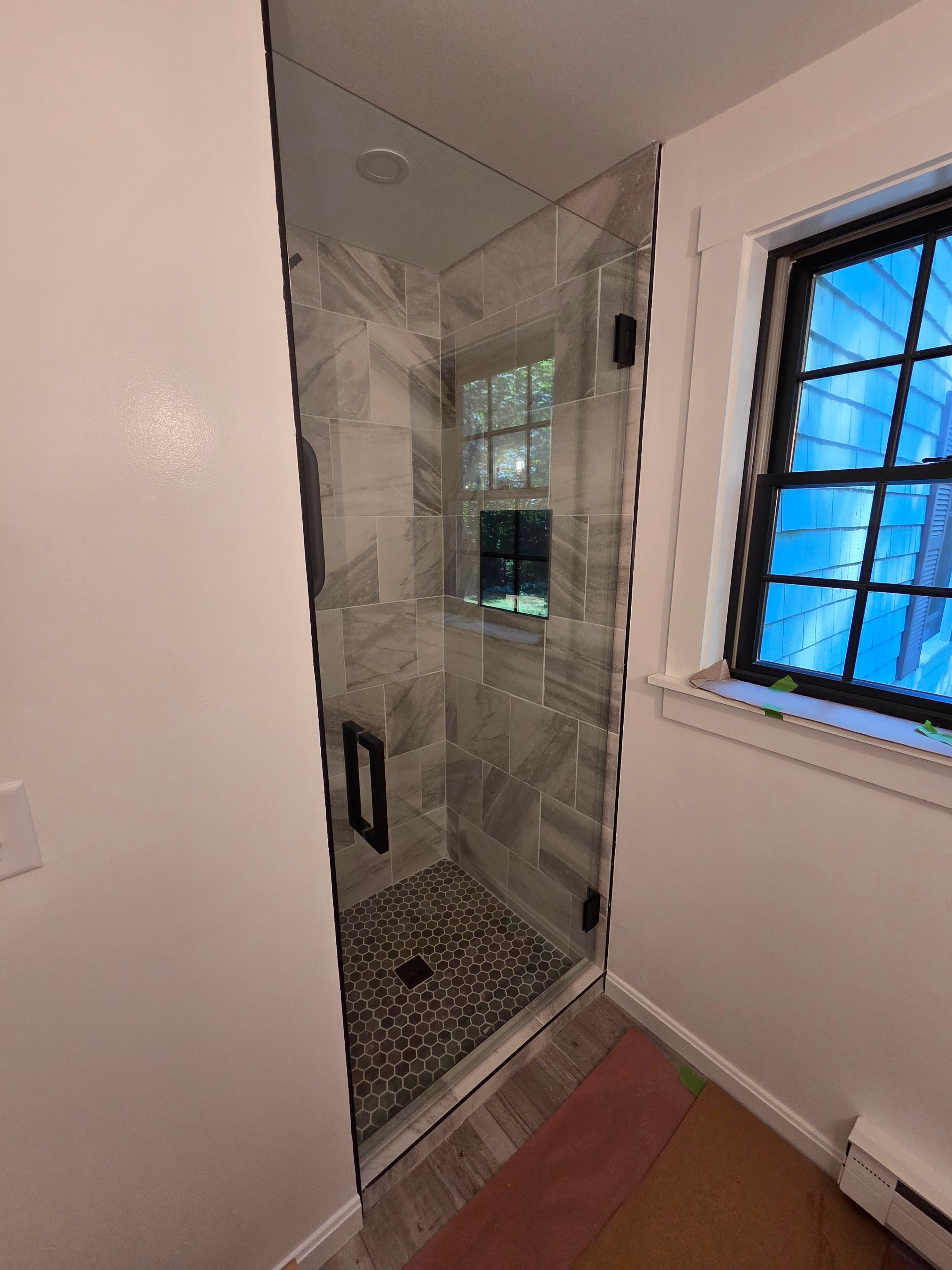 Two Showers using Tempered Shower Glass by Cheshire Glass Company