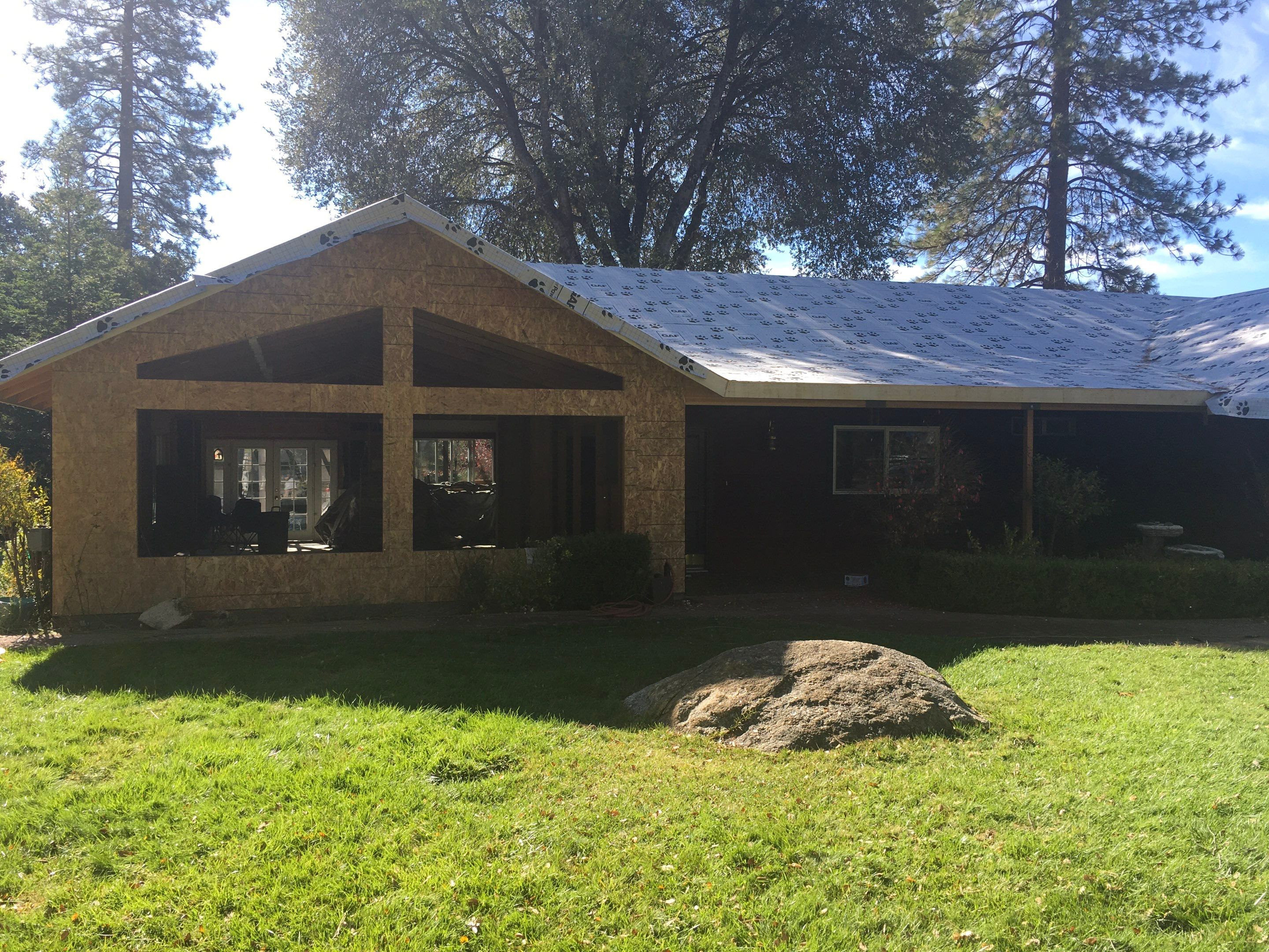 Metal roofing installation using Standing seam metal roofing system by Straight Edge Roofing Inc