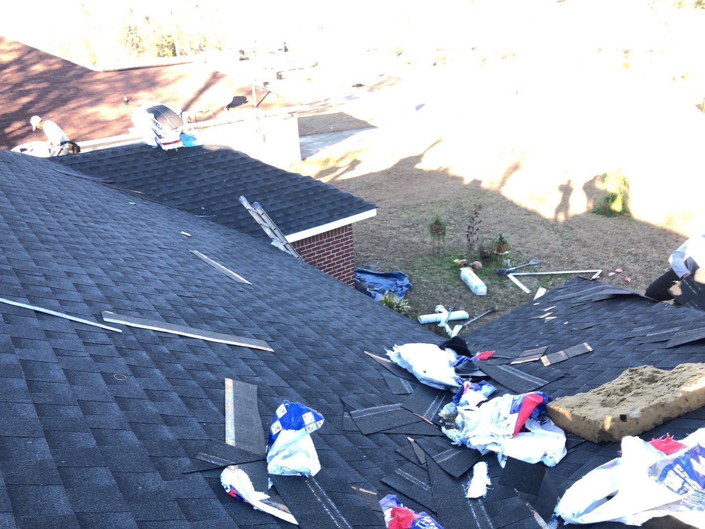 Residential Roofing Installation using Roof Replacement by American Roofing & Construction LLC
