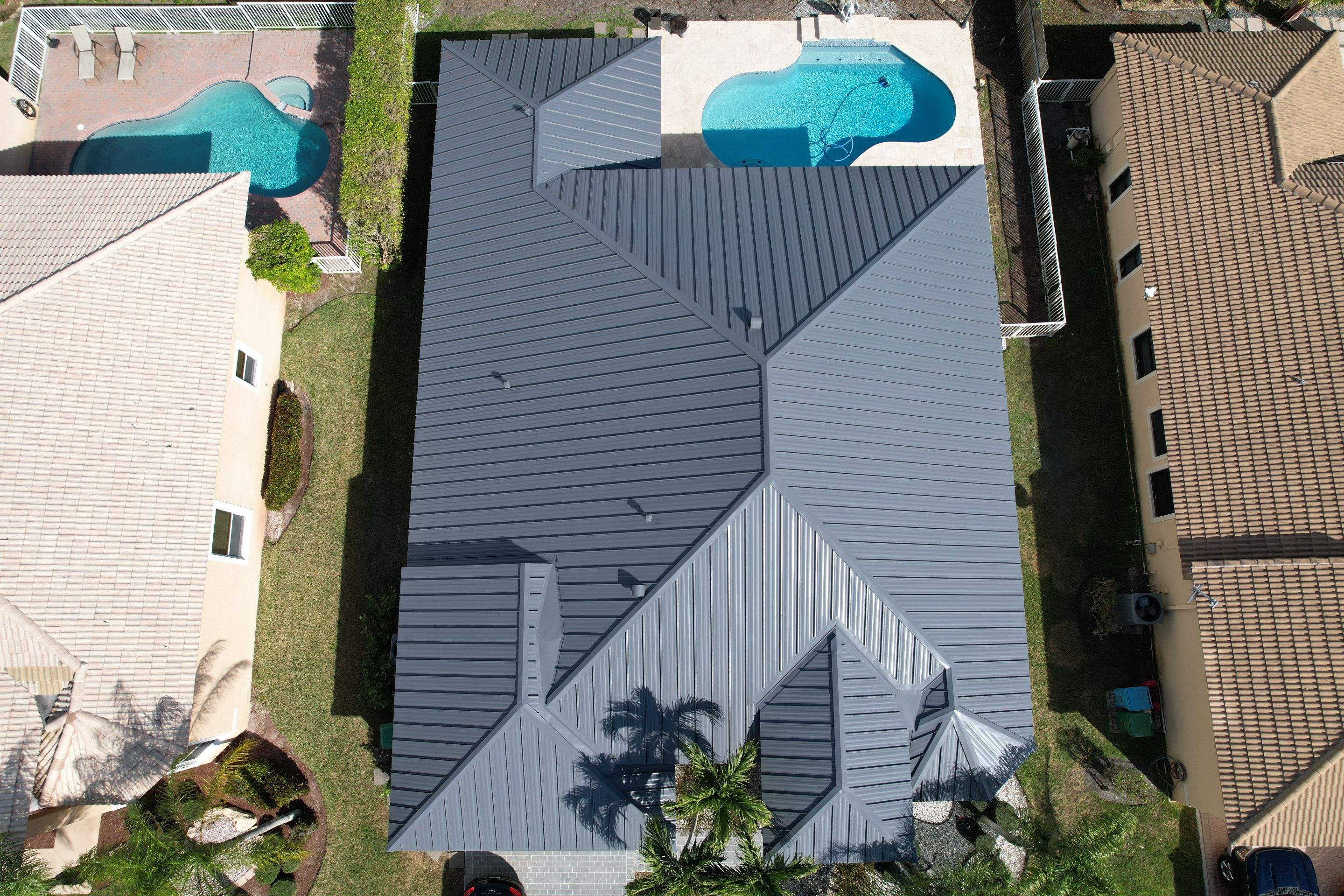 Metal  Roof using Metal Alliance Charcoal Gray by Roofing Recovery