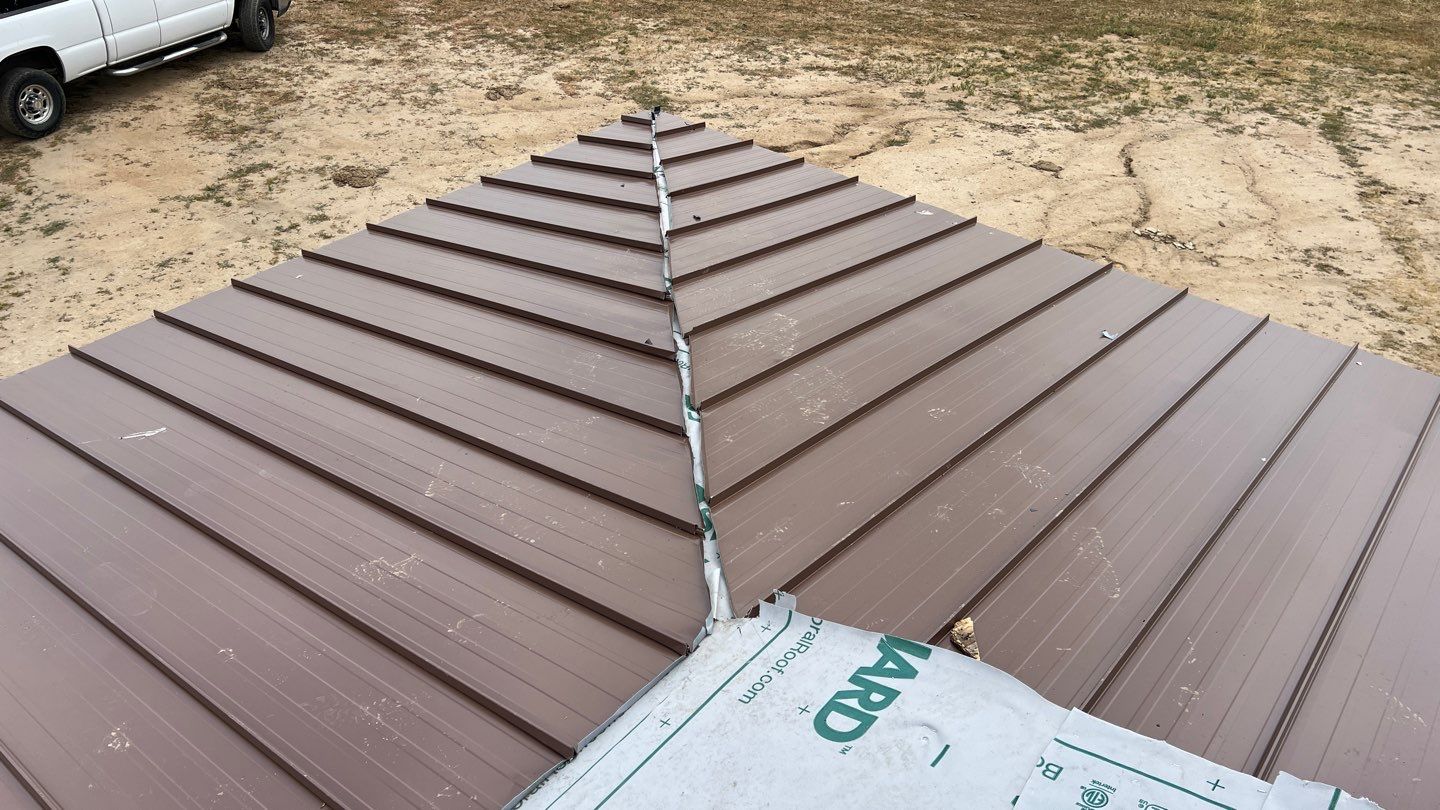Metal roofing installation using Standing seam metal roofing system by Straight Edge Roofing Inc