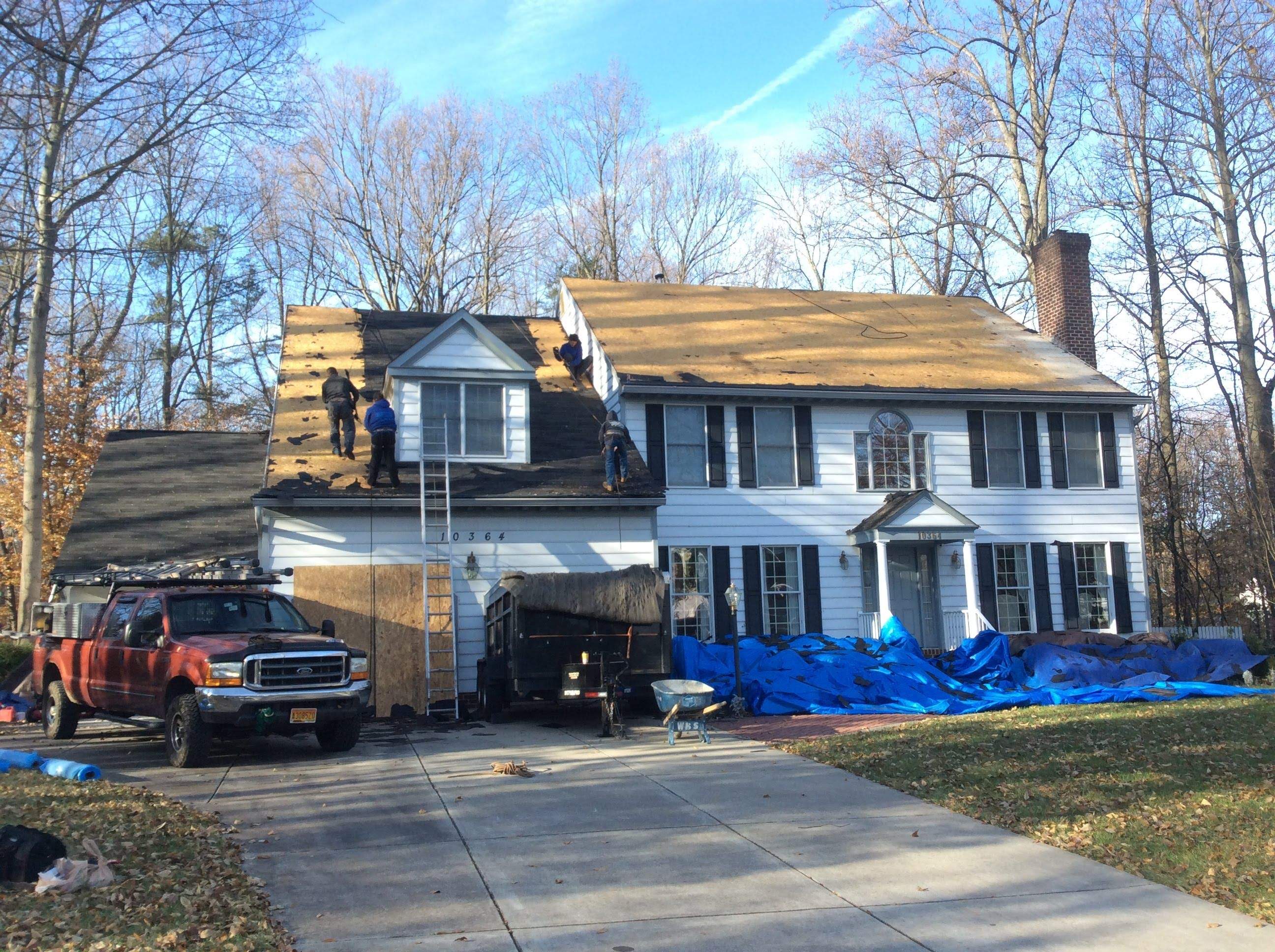 Residential Roofing Installation using Charcoal Black by Alpha Design Services