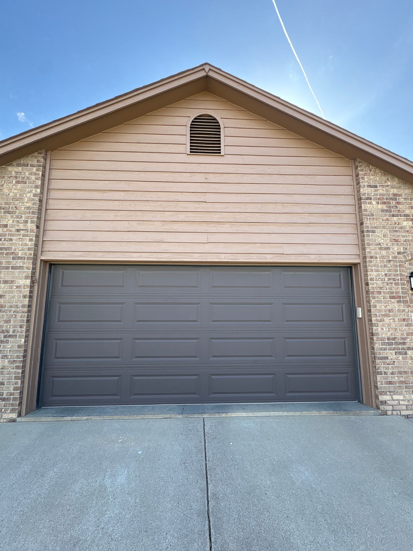Wood Siding Restoration and Exterior Painting in Sioux Falls by Select Painting, Coatings & Garage Cabinets