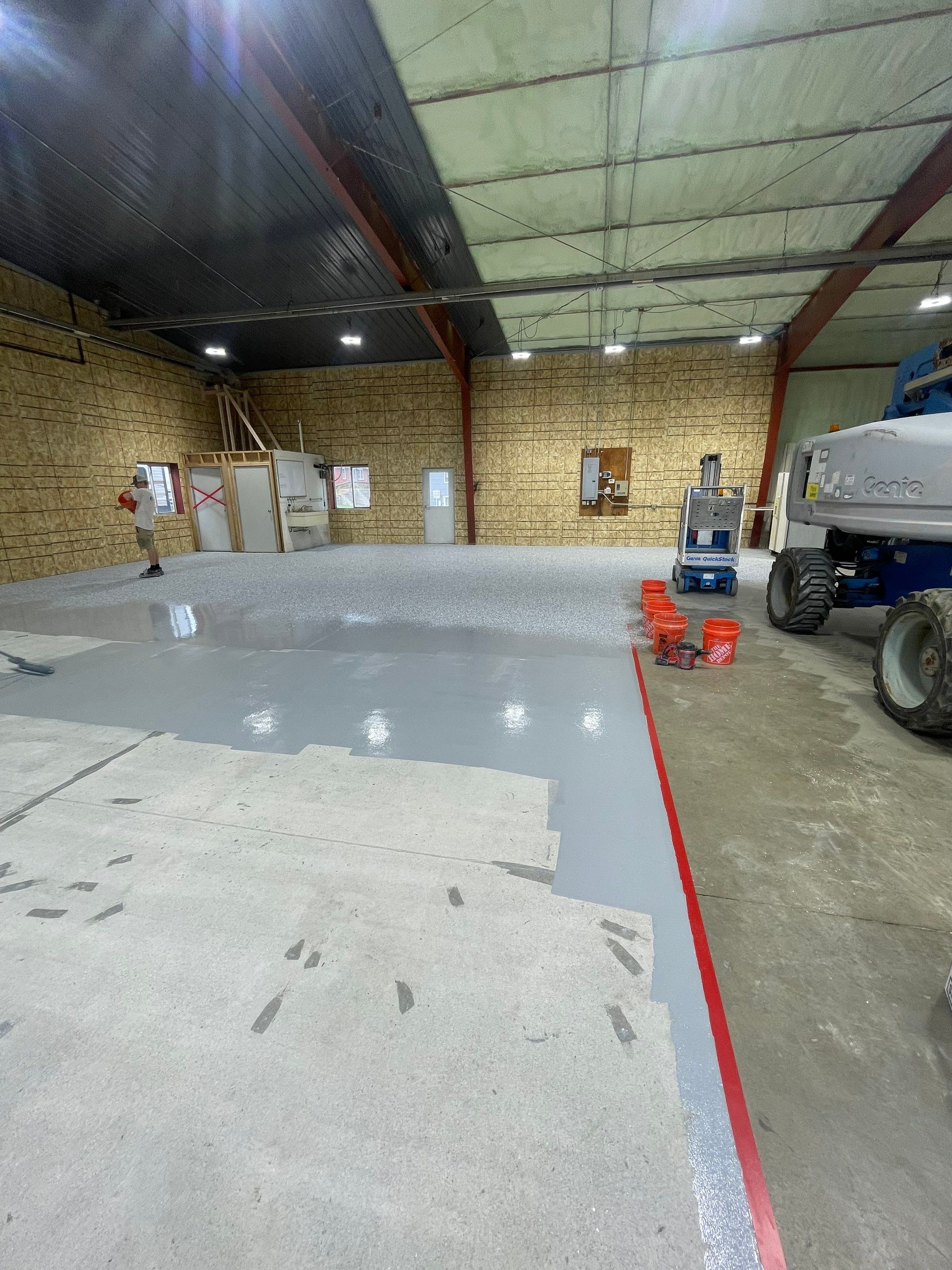 Custom Polyurea Shop Floor with Basketball Court Lines in Rock Valley by Select Painting, Coatings & Garage Cabinets