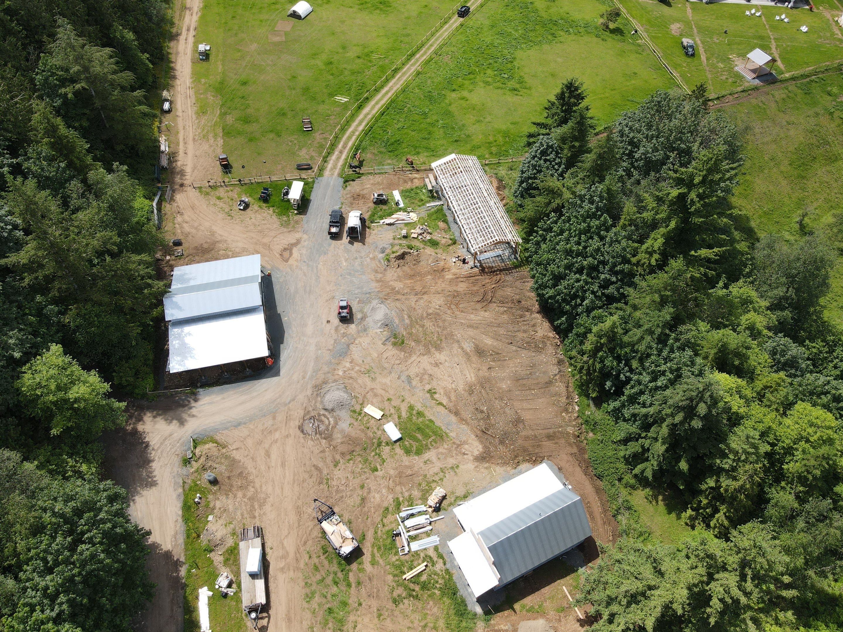 Commercial Roofing Installation using corrugated metal by Top Notch Roofing Inc