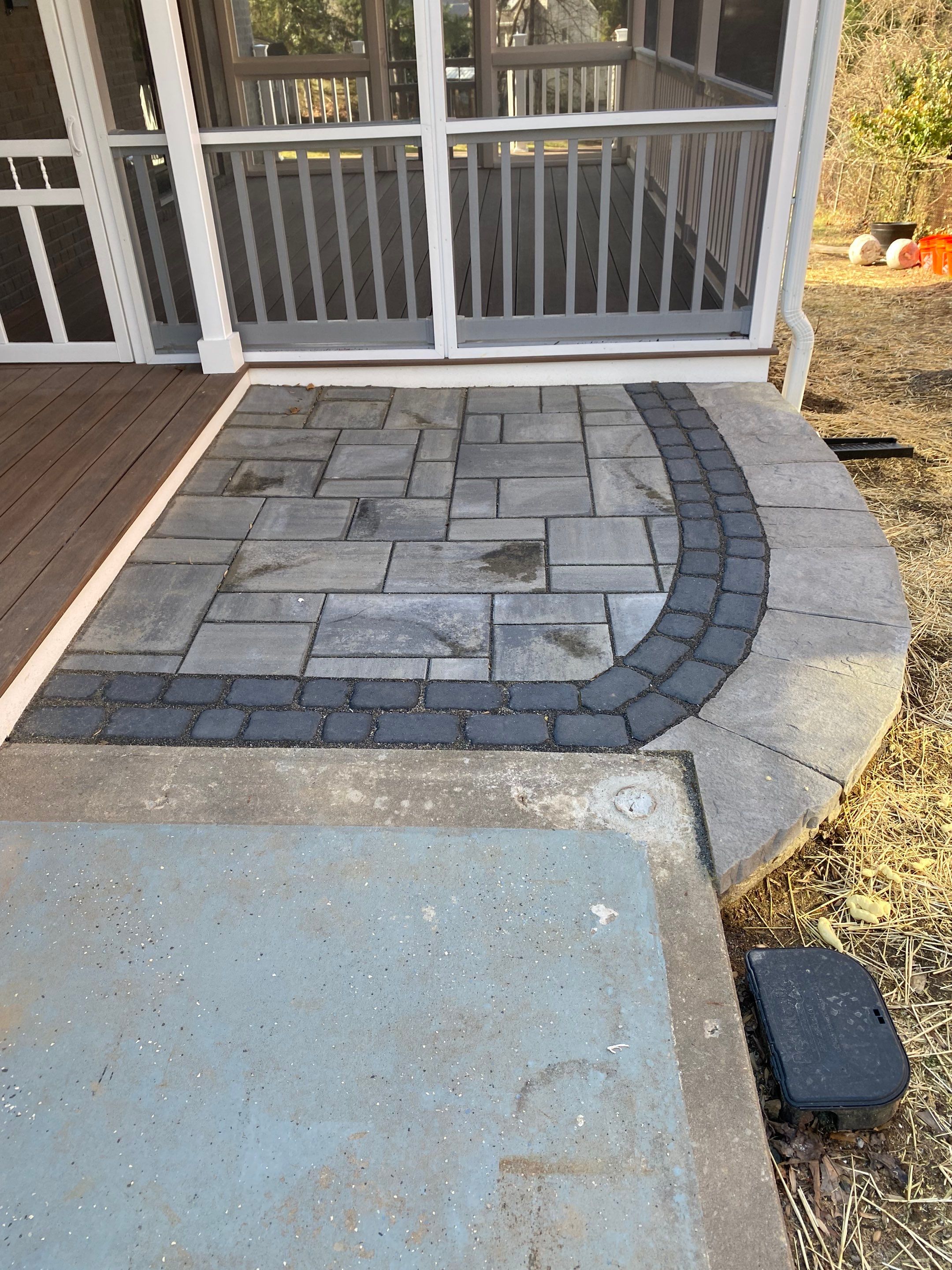 Retaining wall, walkway, small patio and landscape install by The Smet Companies, LLC
