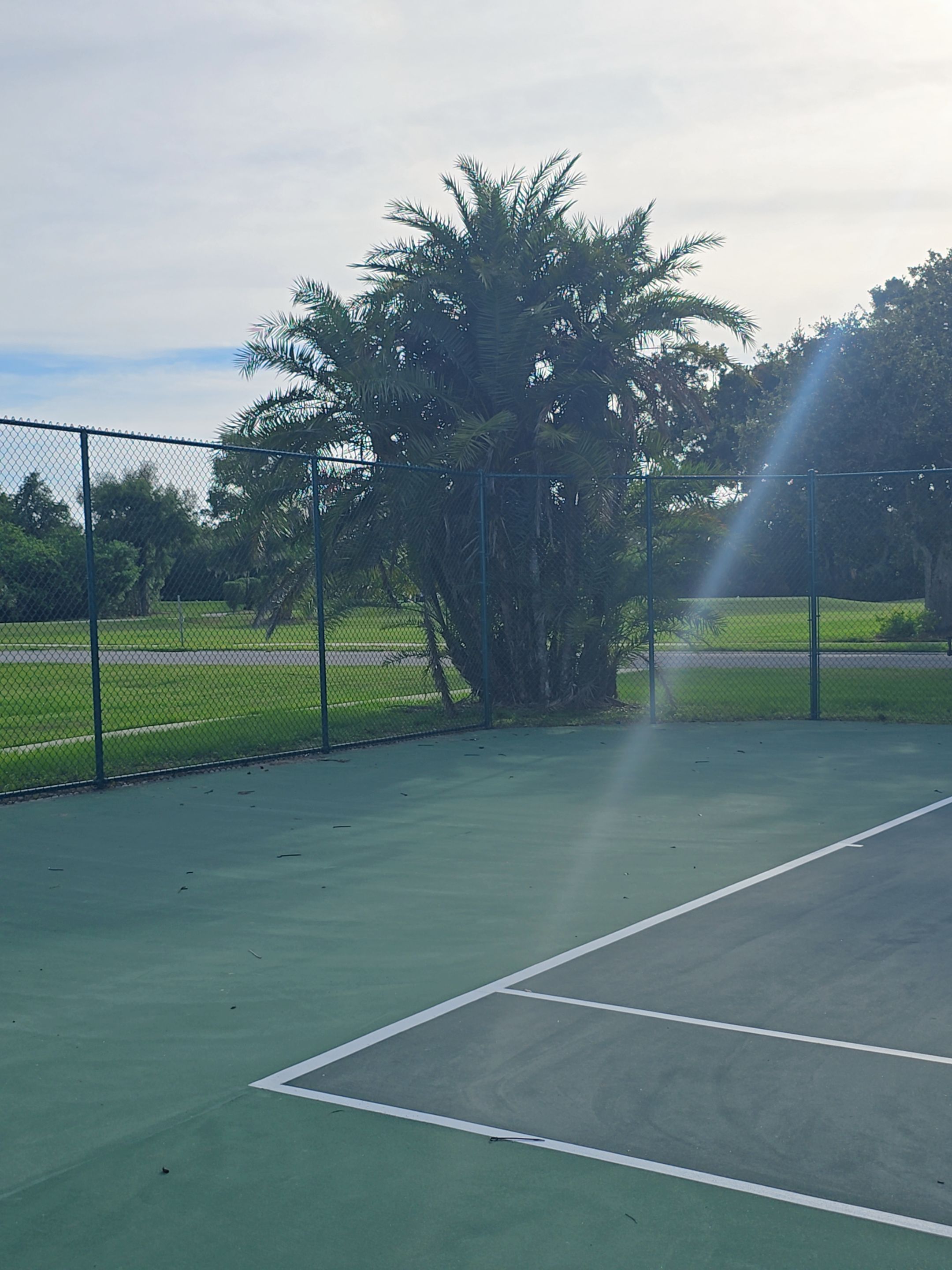 Commercial Tennis Court Chain Link Fence Repair in Sarasota by True Fence LLC