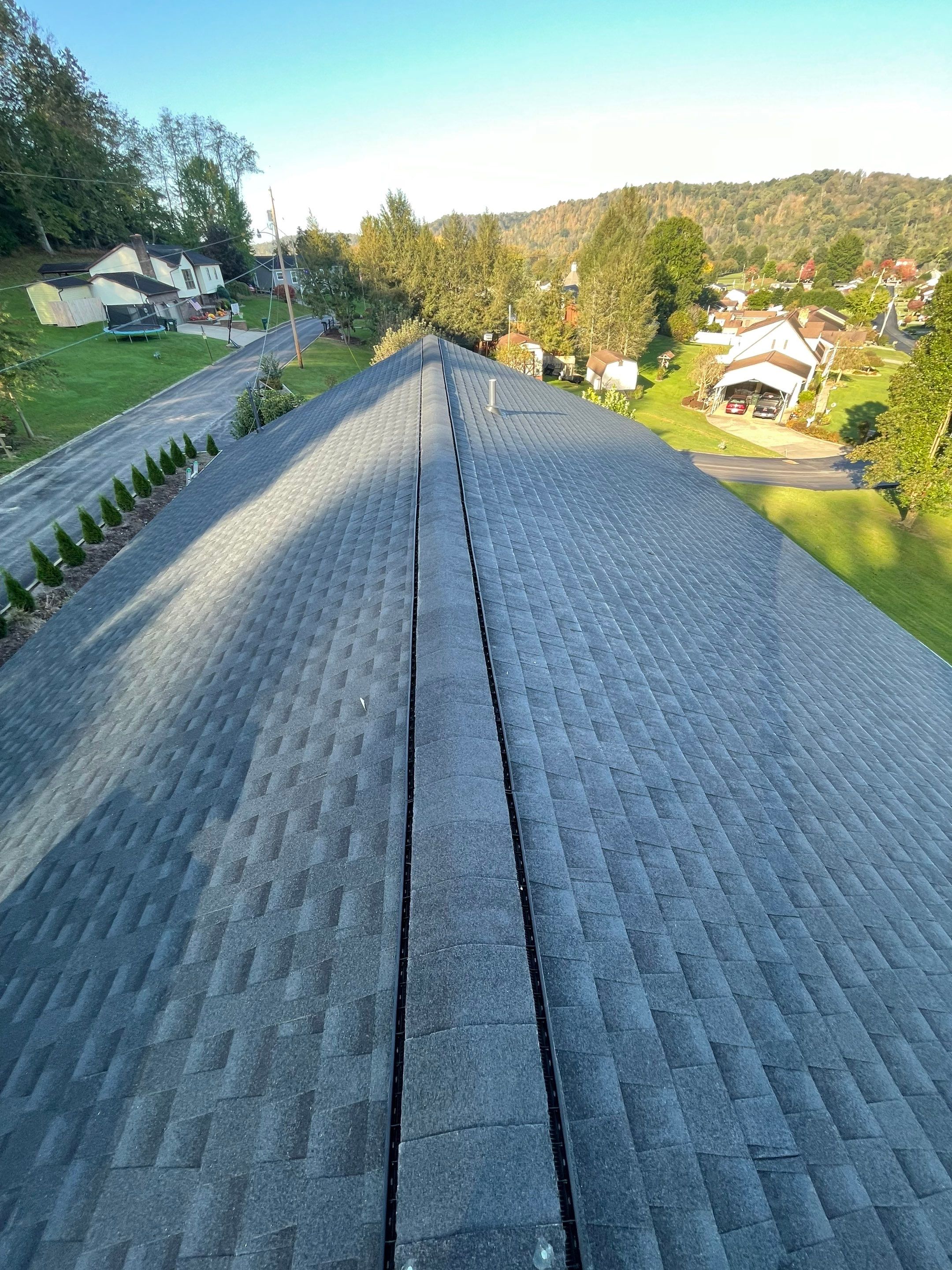 Residential Roofing Installation using GAF Timberline HDZ, Black by Rainstoppers Roofing