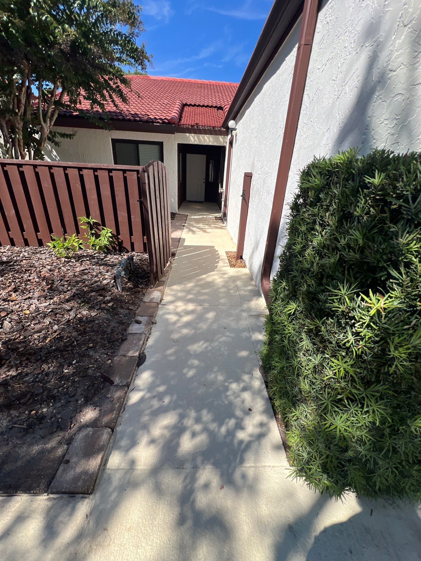 Residential Tile Roof Replacement and Gutter Installation in Winter Park by Pinnacle Roofing Group