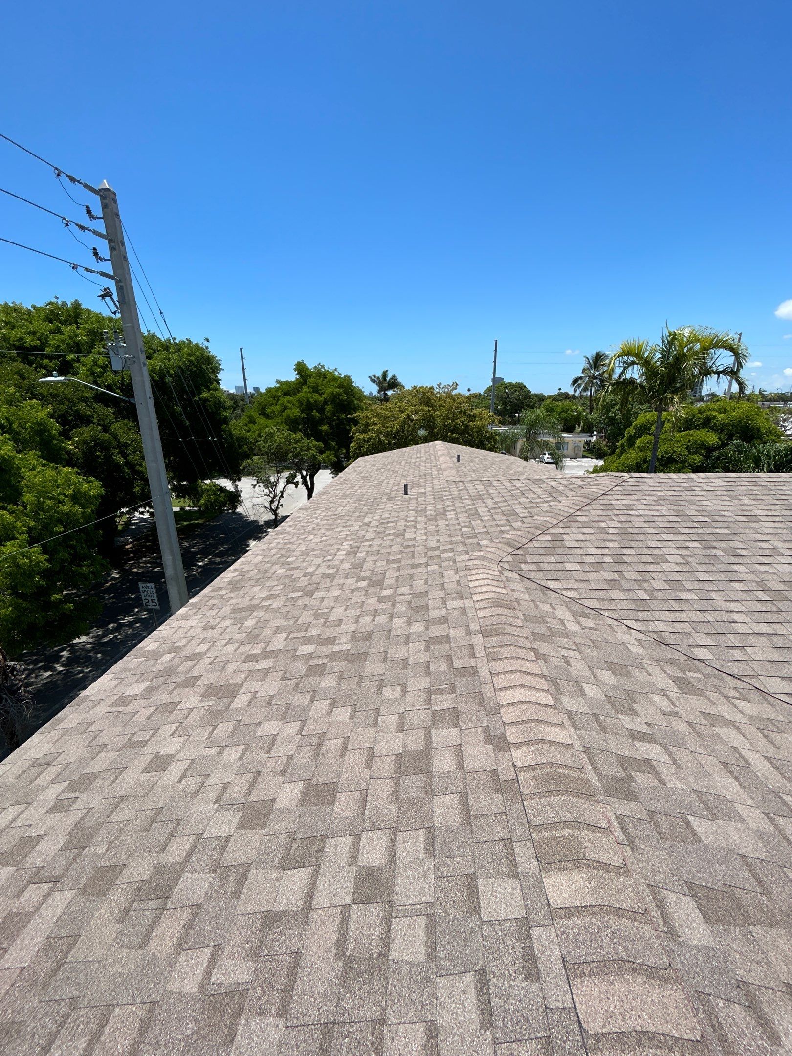 Commercial Roofing Installation using CERTAINTEED LANDMARK AR (SUNRISE CEDAR) by Earl W. Johnston Roofing 