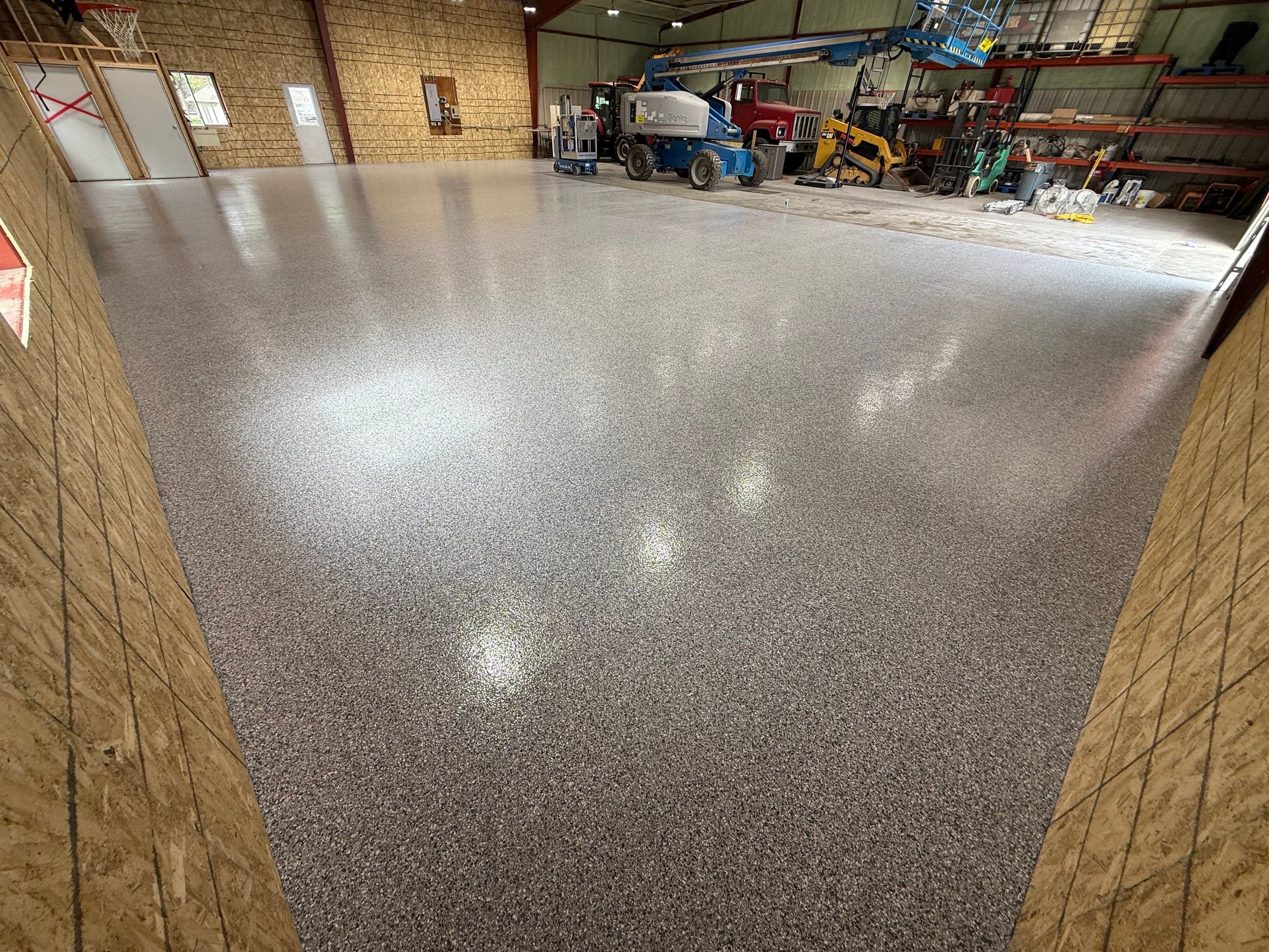 Custom Polyurea Shop Floor with Basketball Court Lines in Rock Valley by Select Painting, Coatings & Garage Cabinets