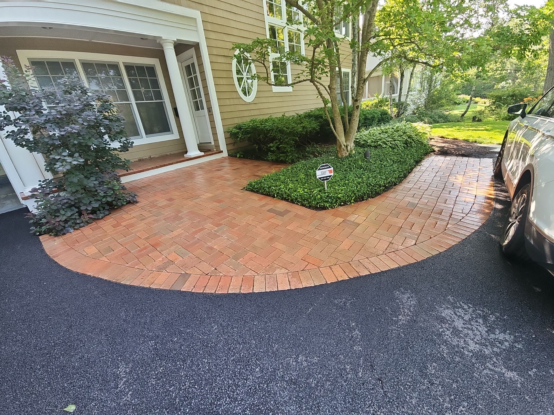 Highland Park brick cleaning by Northern Power Washing LLC.