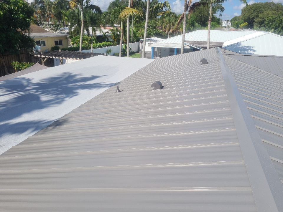 Residential Roofing Installation using 1" Nail strip metal roof by BLUES BROTHERS CONSTRUCTION CORP