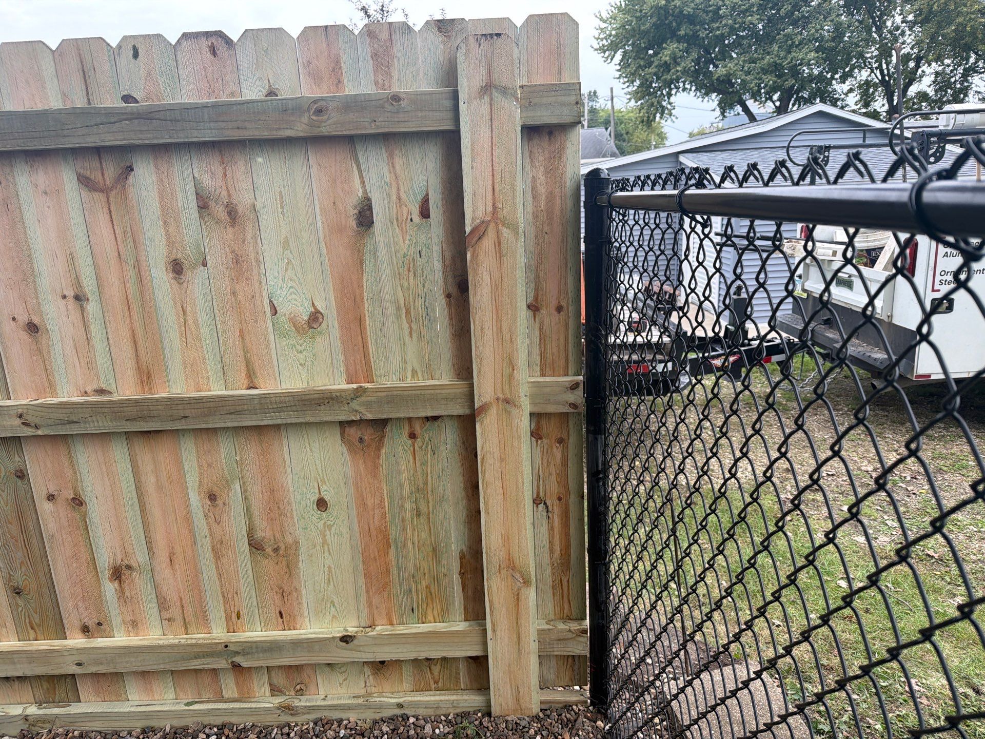 Custom Wood Privacy and Black Chain Link Fence in Hudson by Perfect Picket Fence and Stain