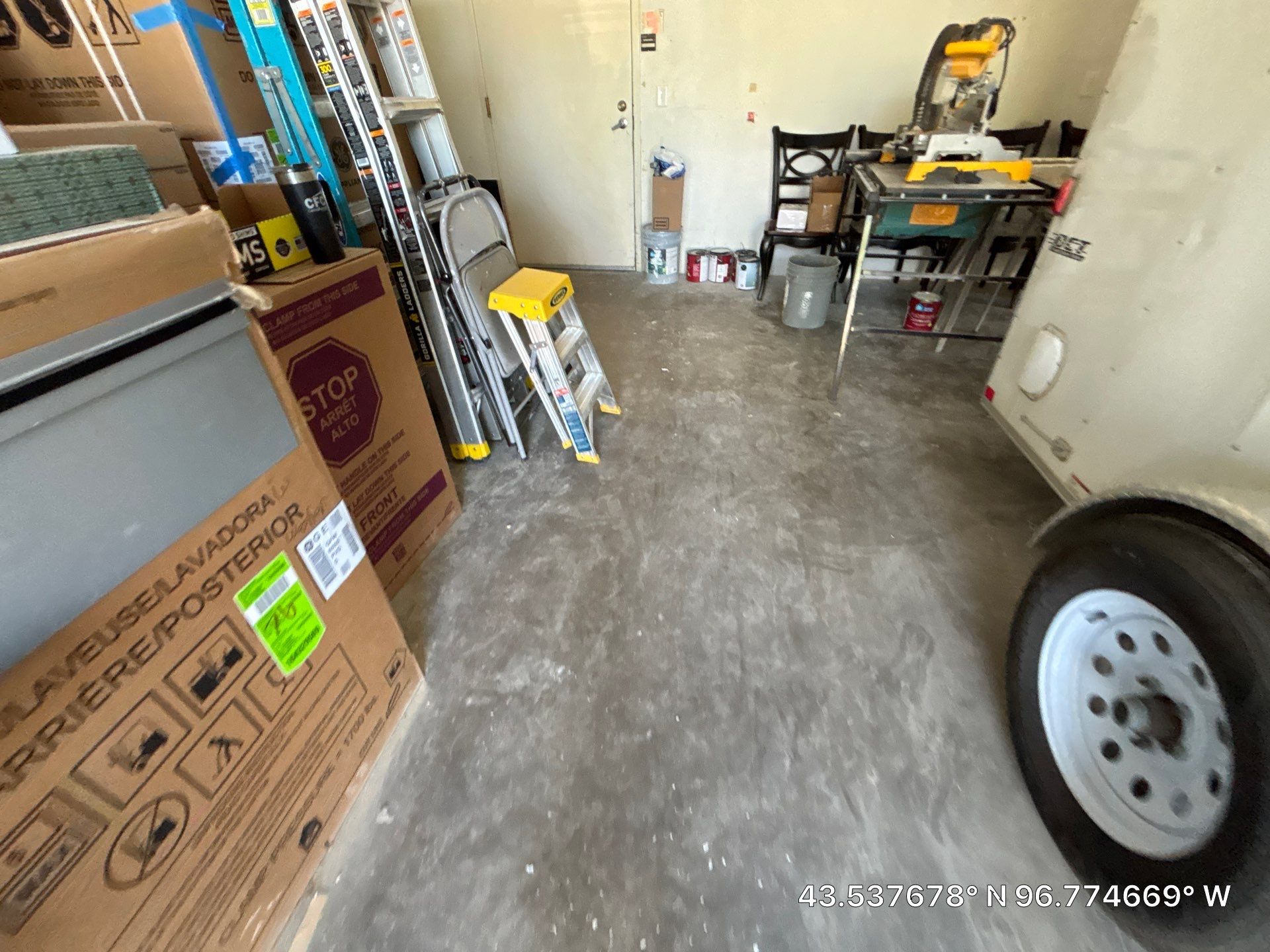 Coyote Flake Concrete Coating for Sioux Falls Garage by Select Painting, Coatings & Garage Cabinets