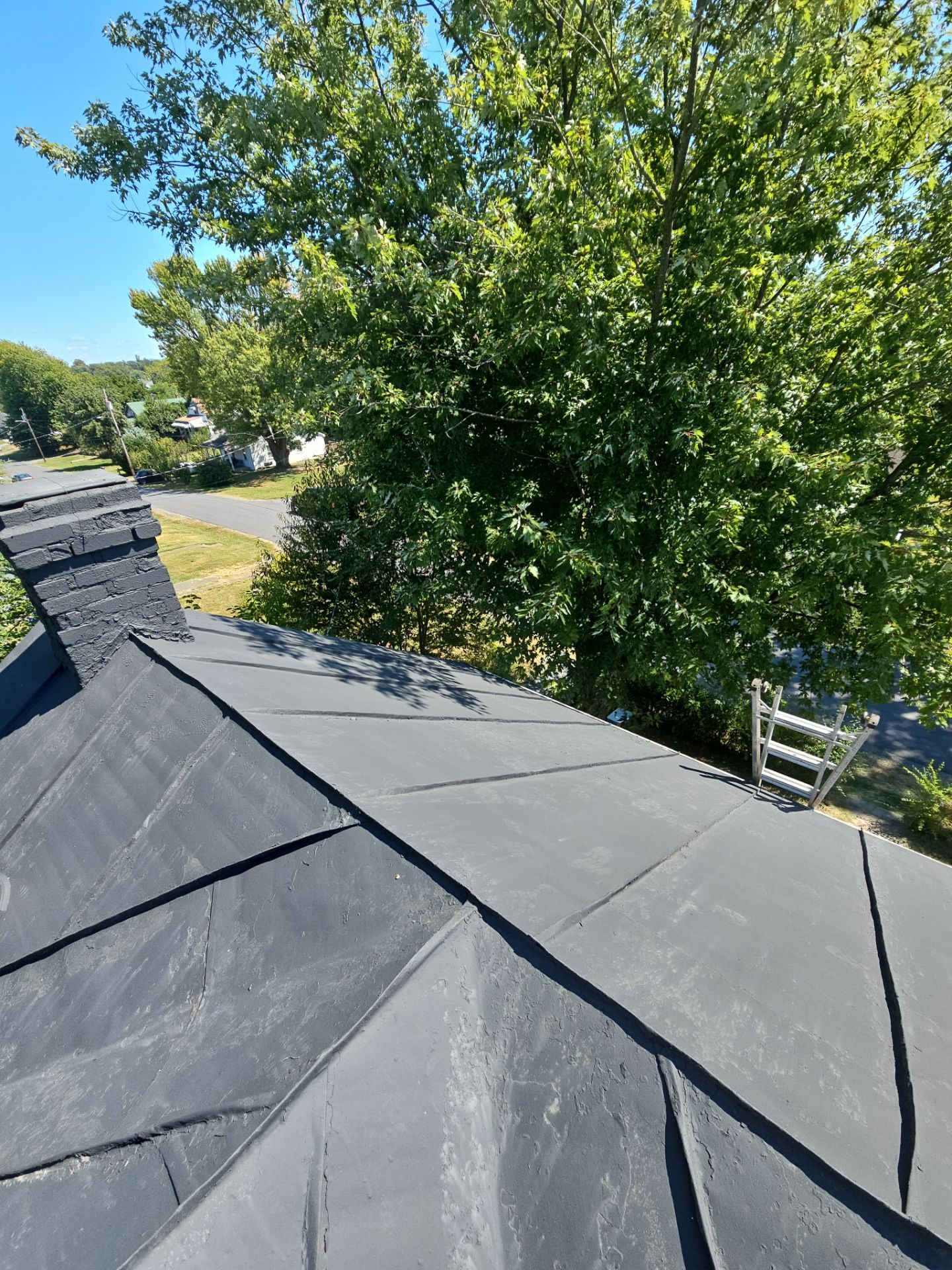 Metal Roof and Gutter Replacement by Winchester Roofing