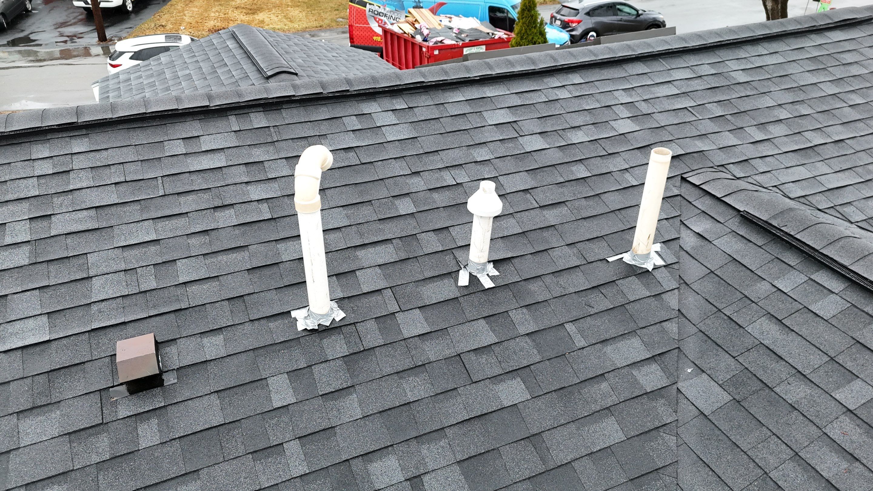Full Roof Replacement & Complete PVC Trim System in Lowell, MA by Mighty Dog Roofing of Greater Middlesex County