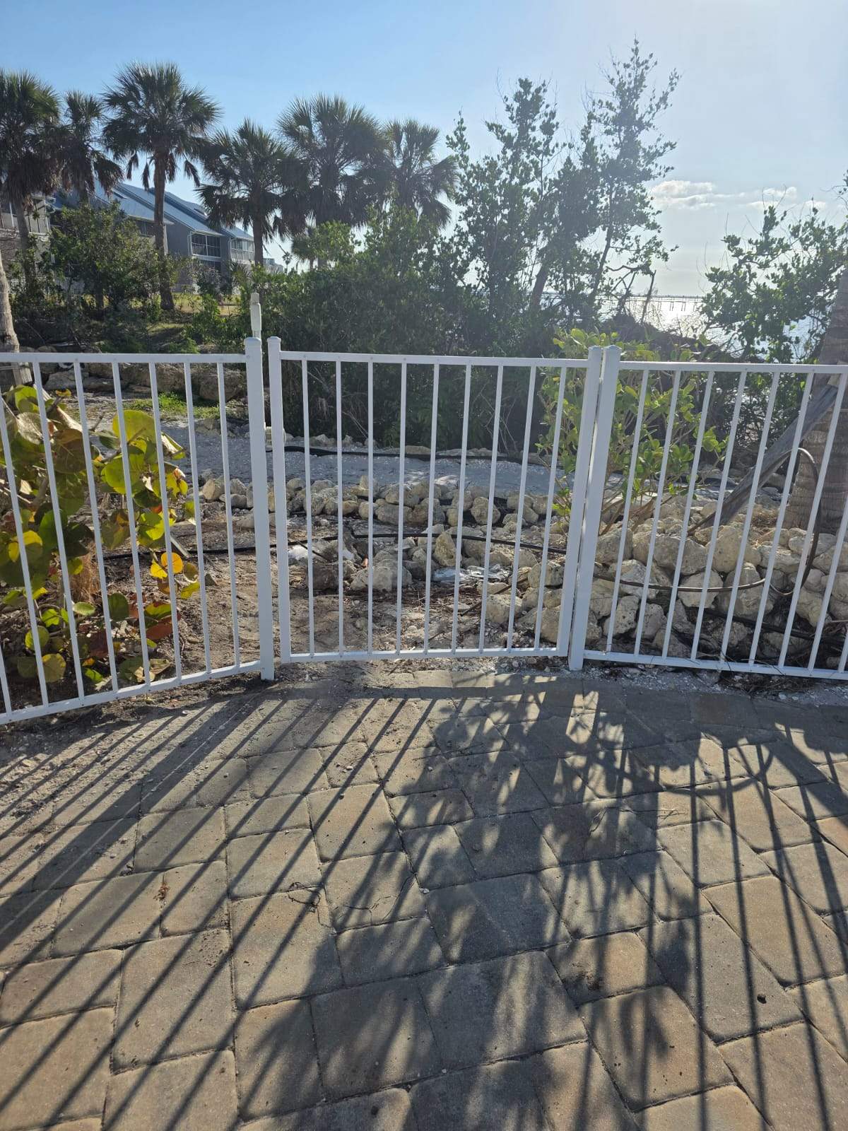 White Aluminum Railing Installation for Commercial Property in Port Charlotte by True Fence LLC