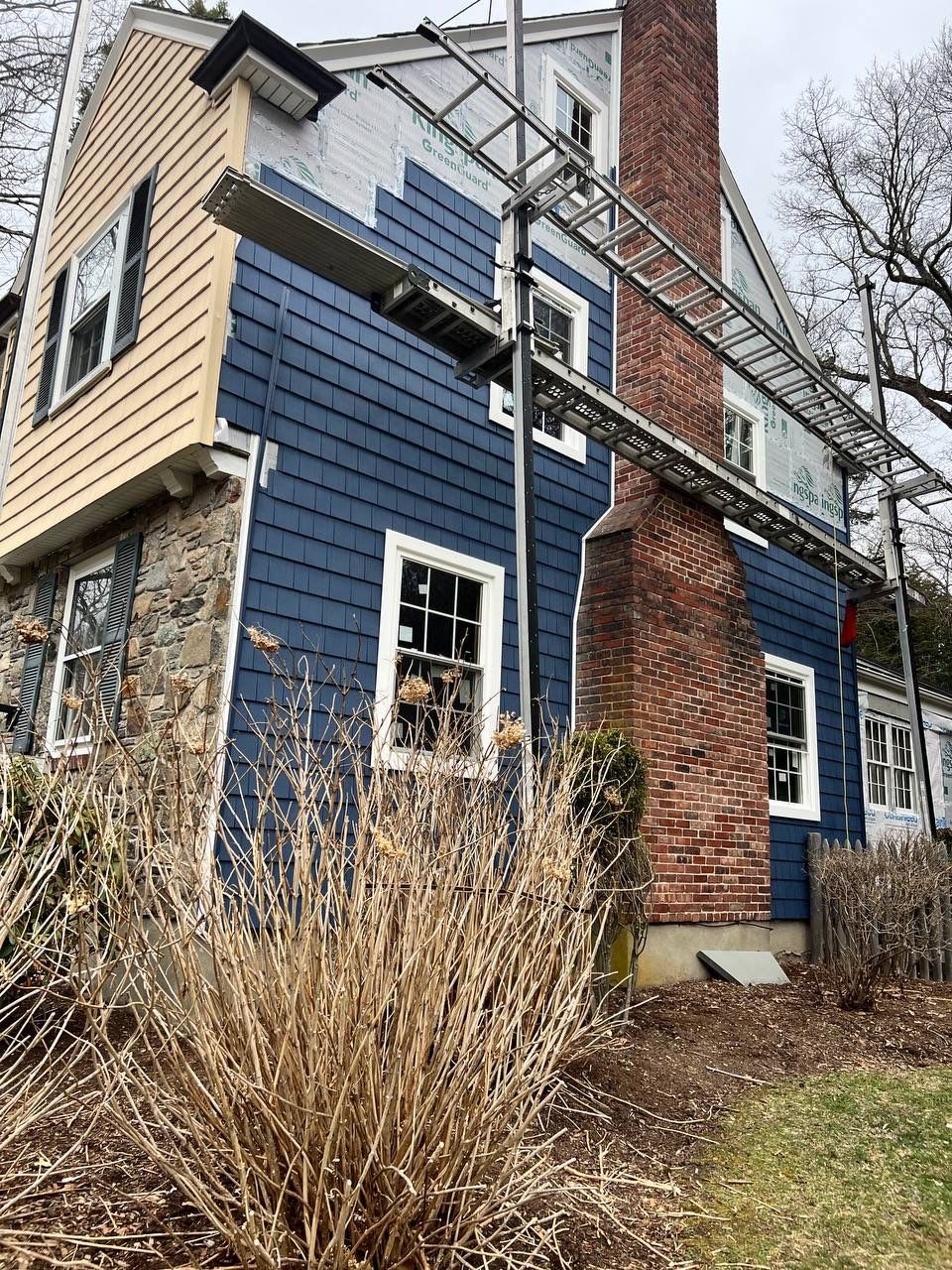 Siding Installation using Certainteed Vinyl Cedar Impressions by GF Sprague Exteriors