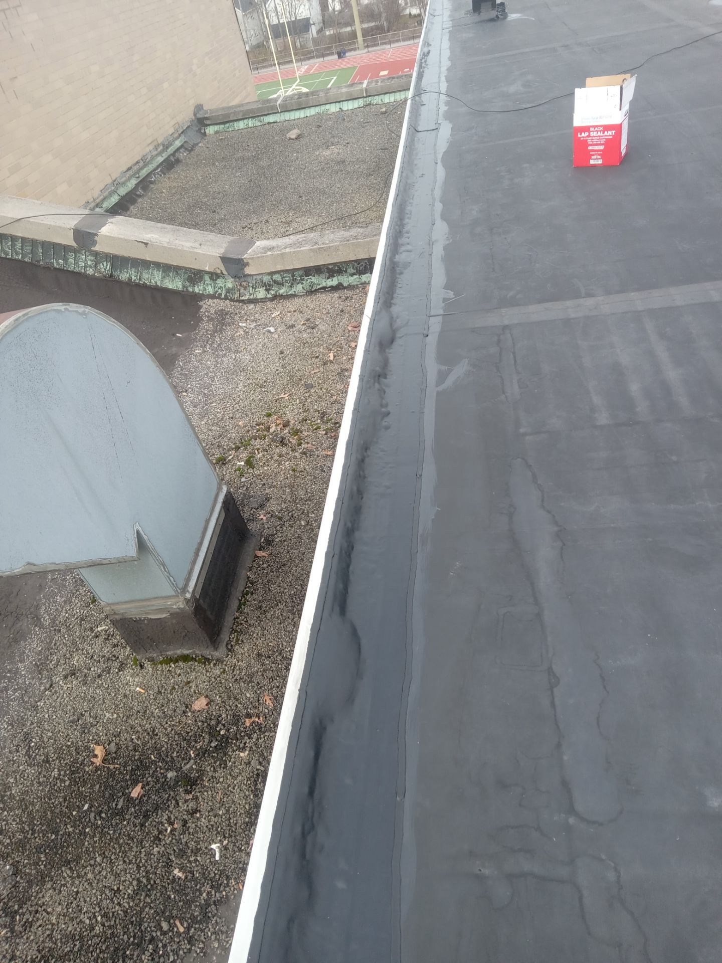 Commercial Roofing using Roof Replacement by Absolute Roofing and Construction