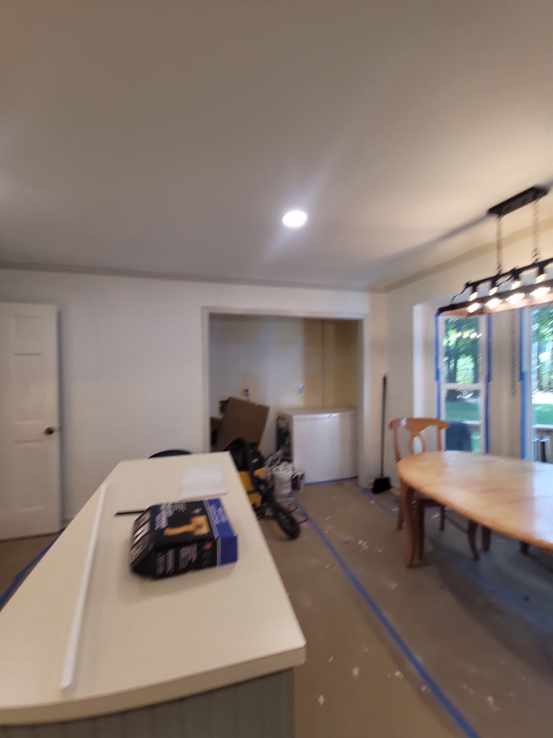 A Pathway to Personality – A Two-Tone Kitchen Transformation in Apex by Elite Remodeling and Design LLC