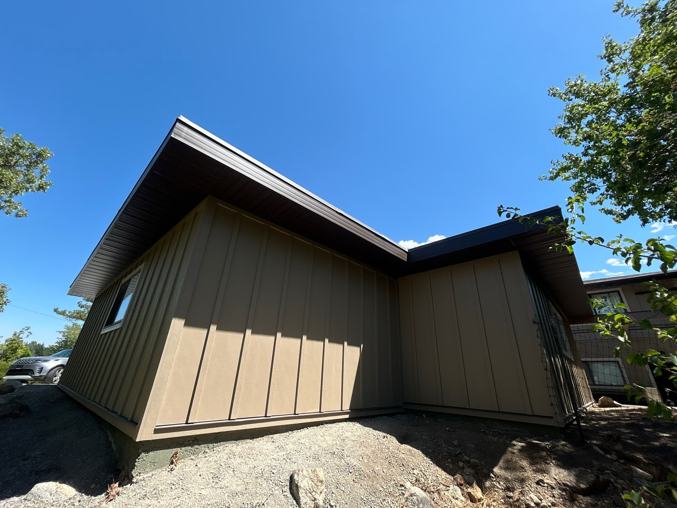 Complete Hardie Colorplus Board and Batten replacement with Custom Soffit Transformation in Sandy by Ideal Siding Utah