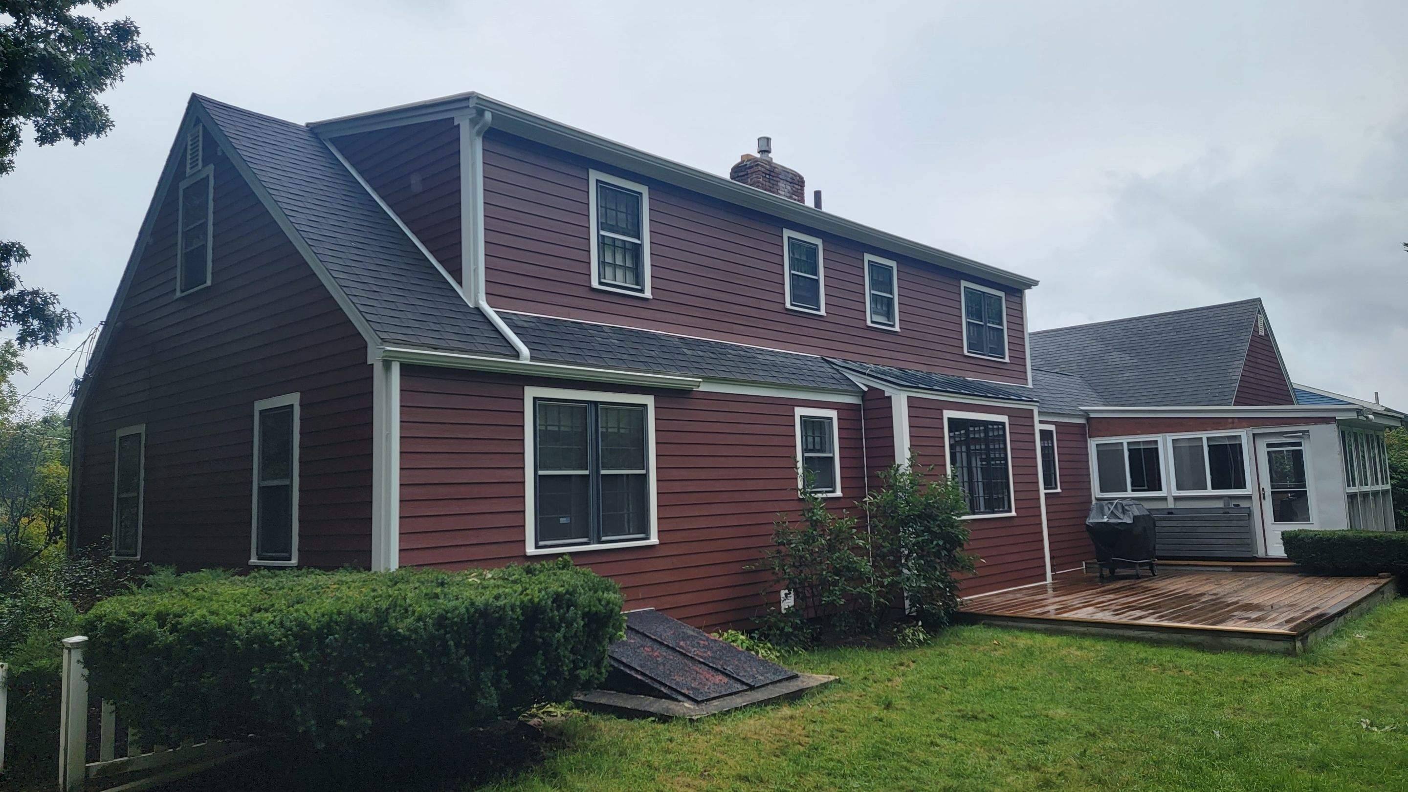Siding Installation using James Hardie Countrylane red by UBrothers Construction