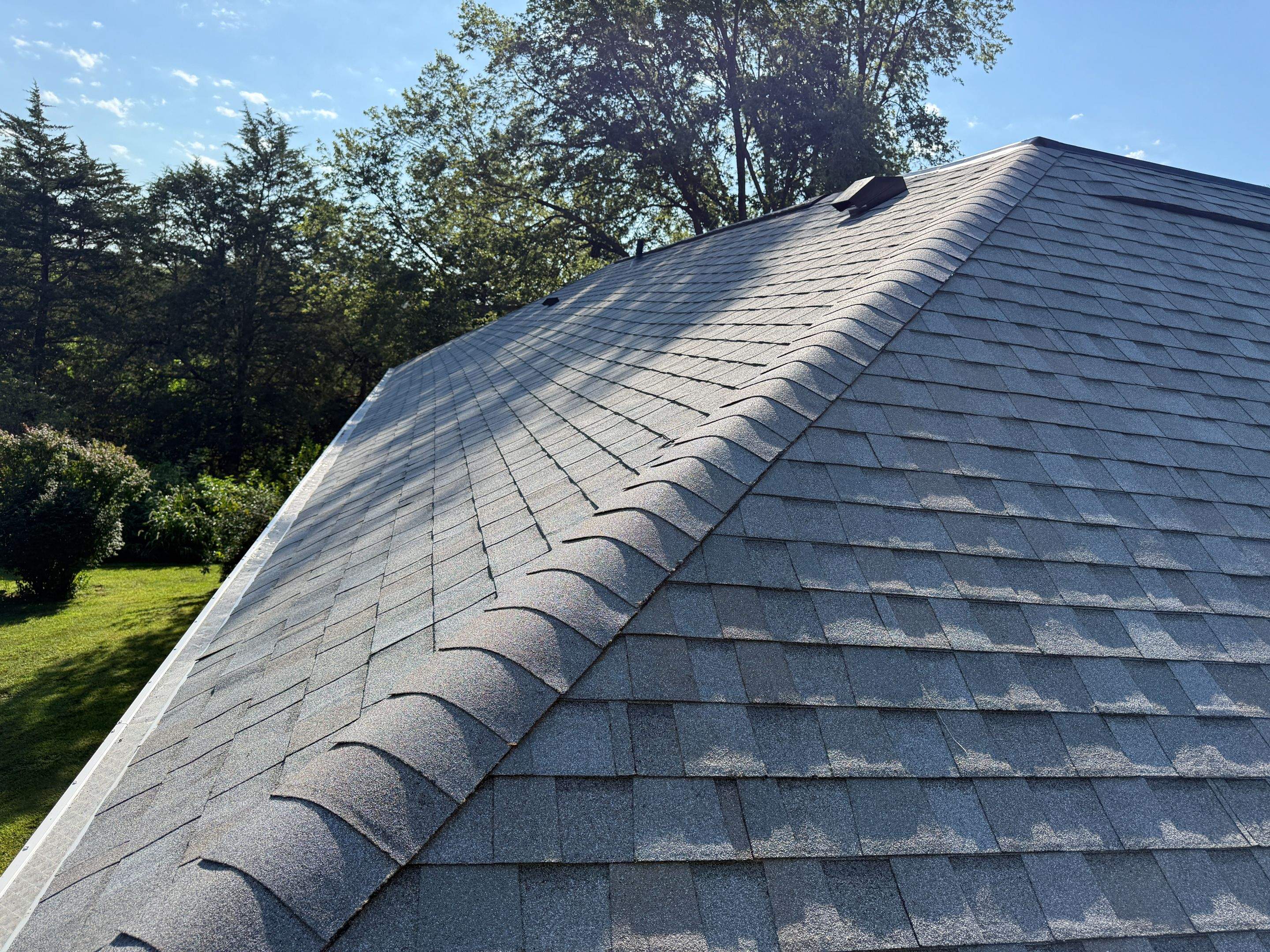 Asphalt Shingle and EPDM Membrane Roof Installation in Mineola by Star Home