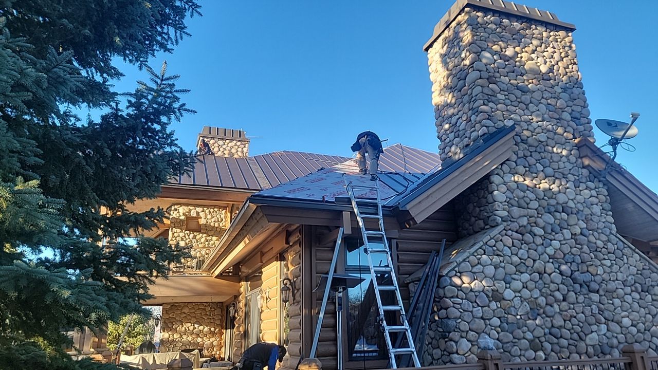 Standing Seam Metal Roof Replacement After Snow Damage by ASAP Roofing & Restoration