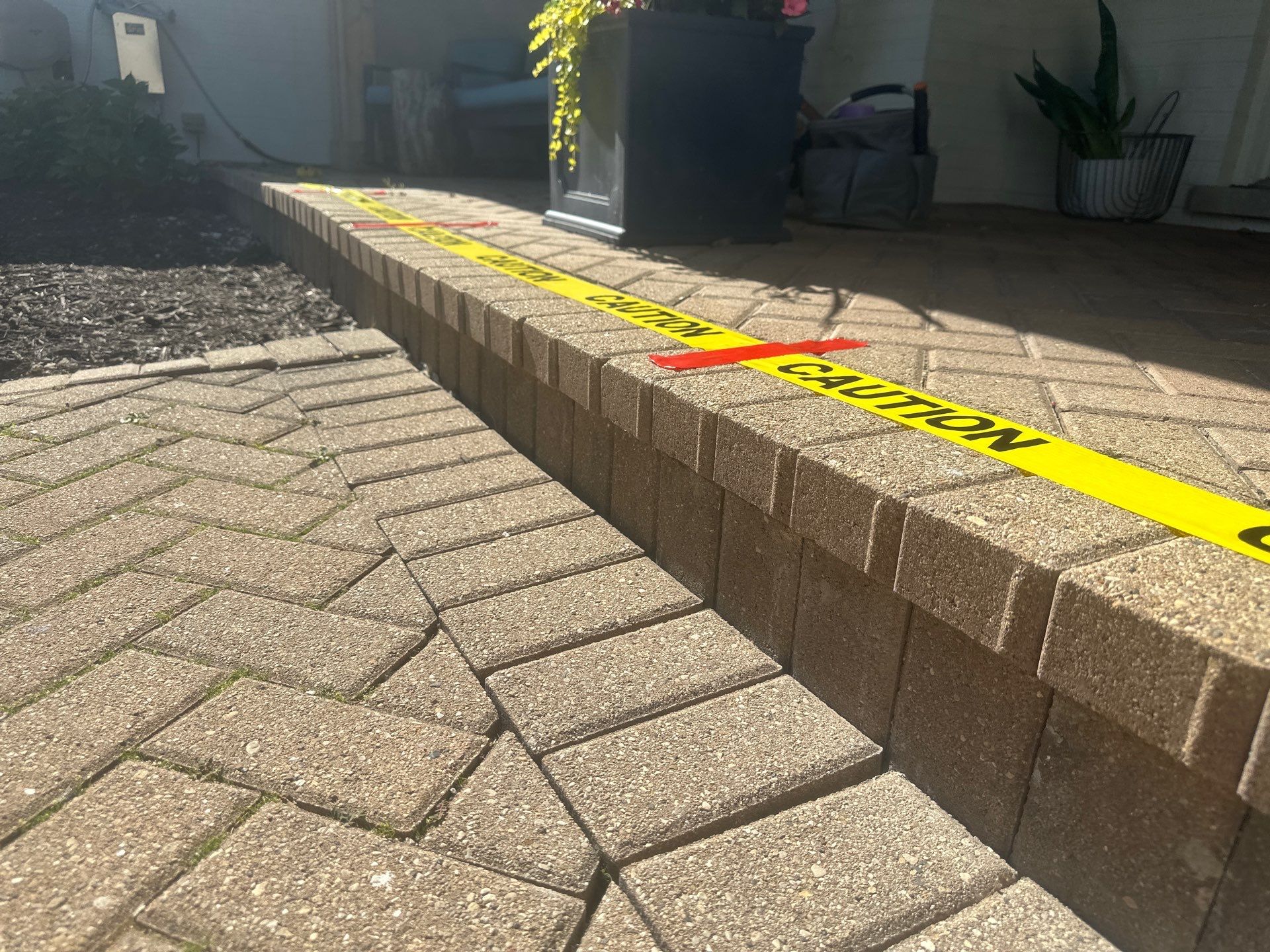 Brick paver repair, cleaning and sealing by Northern Power Washing LLC.