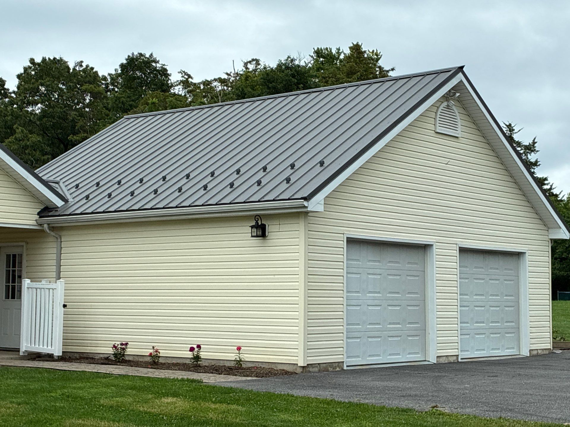 Newport Metal Roof Replacement with New Skylights by Esh Builders