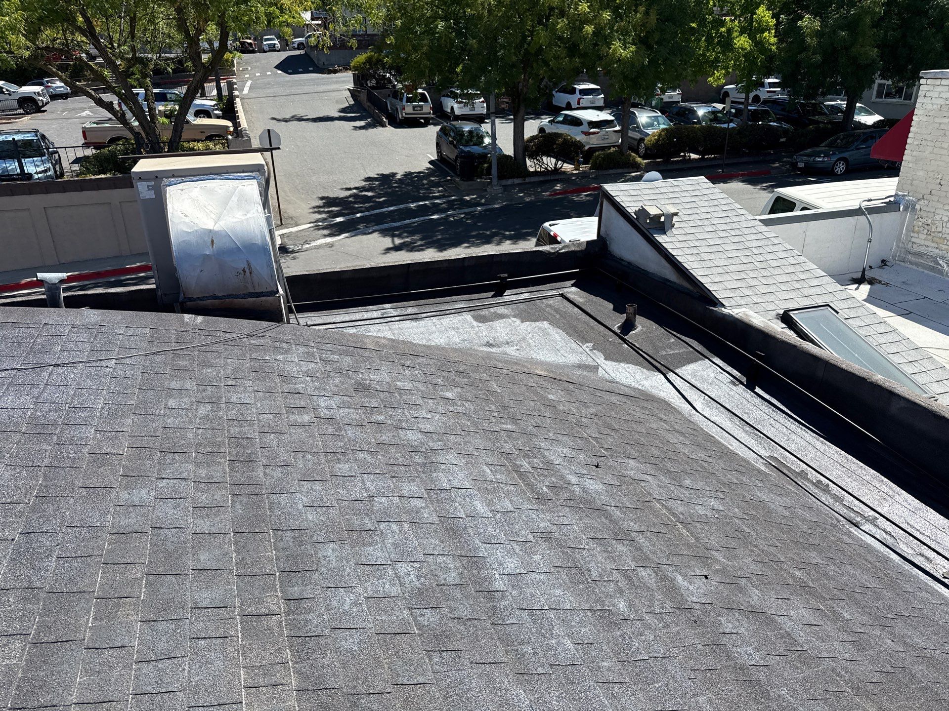 Foam and coatings on commercial roof by Straight Edge Roofing Inc