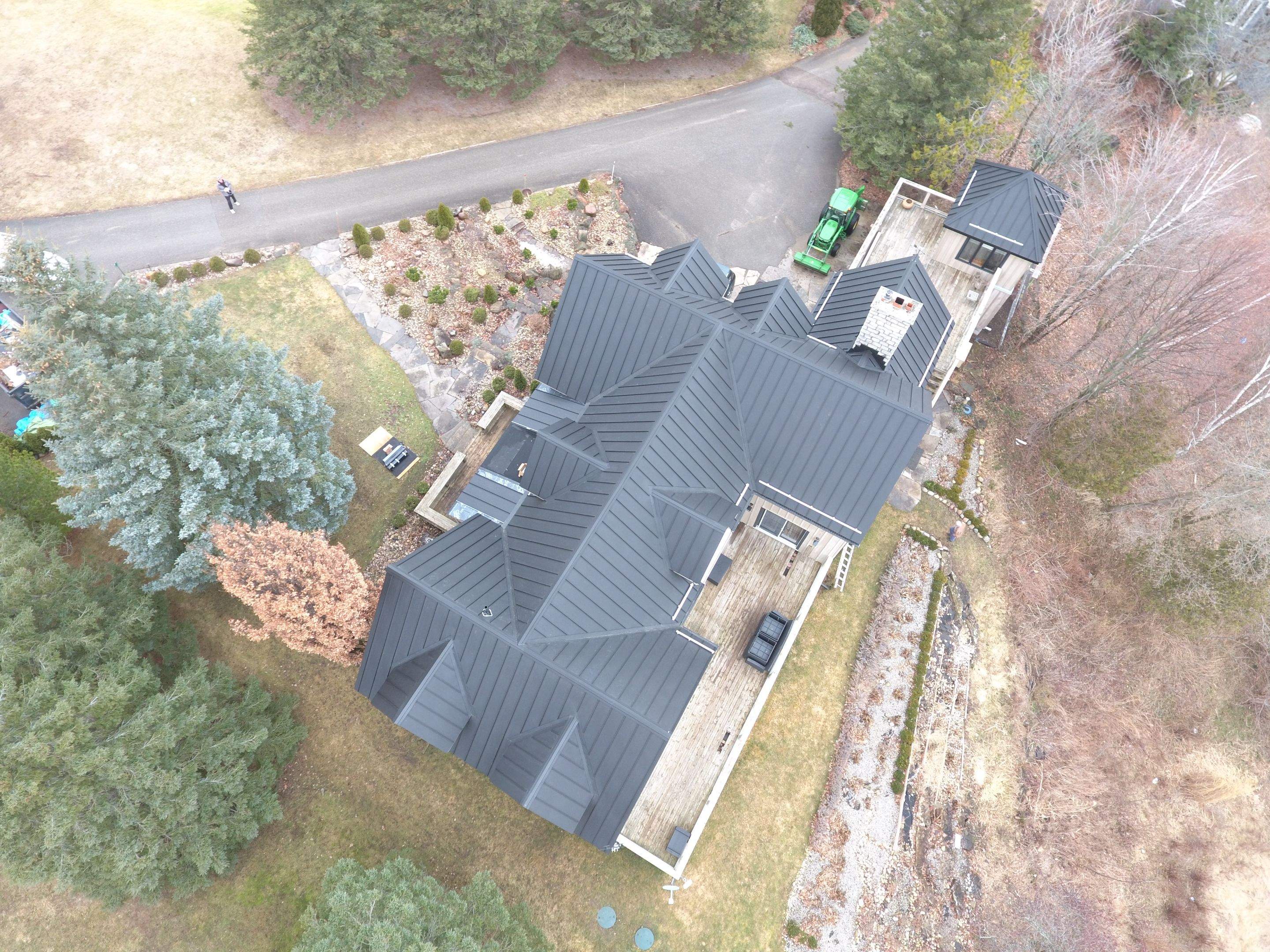Residential Roofing Installation using 24 Ga Standing Seam Metal by Jay Carter Roofing & Sheet Metal