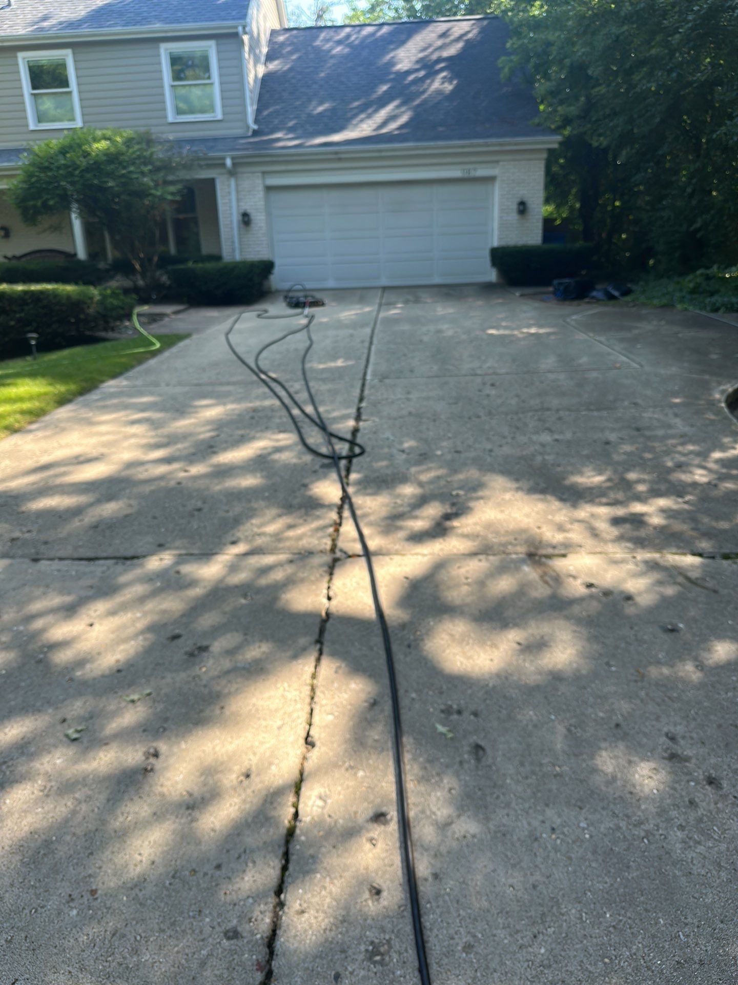 Aggregate concrete cleaning and sealing using Surebond SB-9000 by Northern Power Washing LLC.