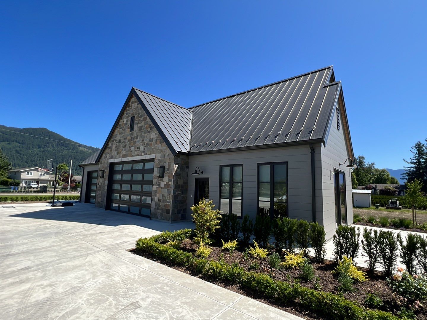 Residential Roofing Installation using 12" Prolok metal  by Top Notch Roofing Inc