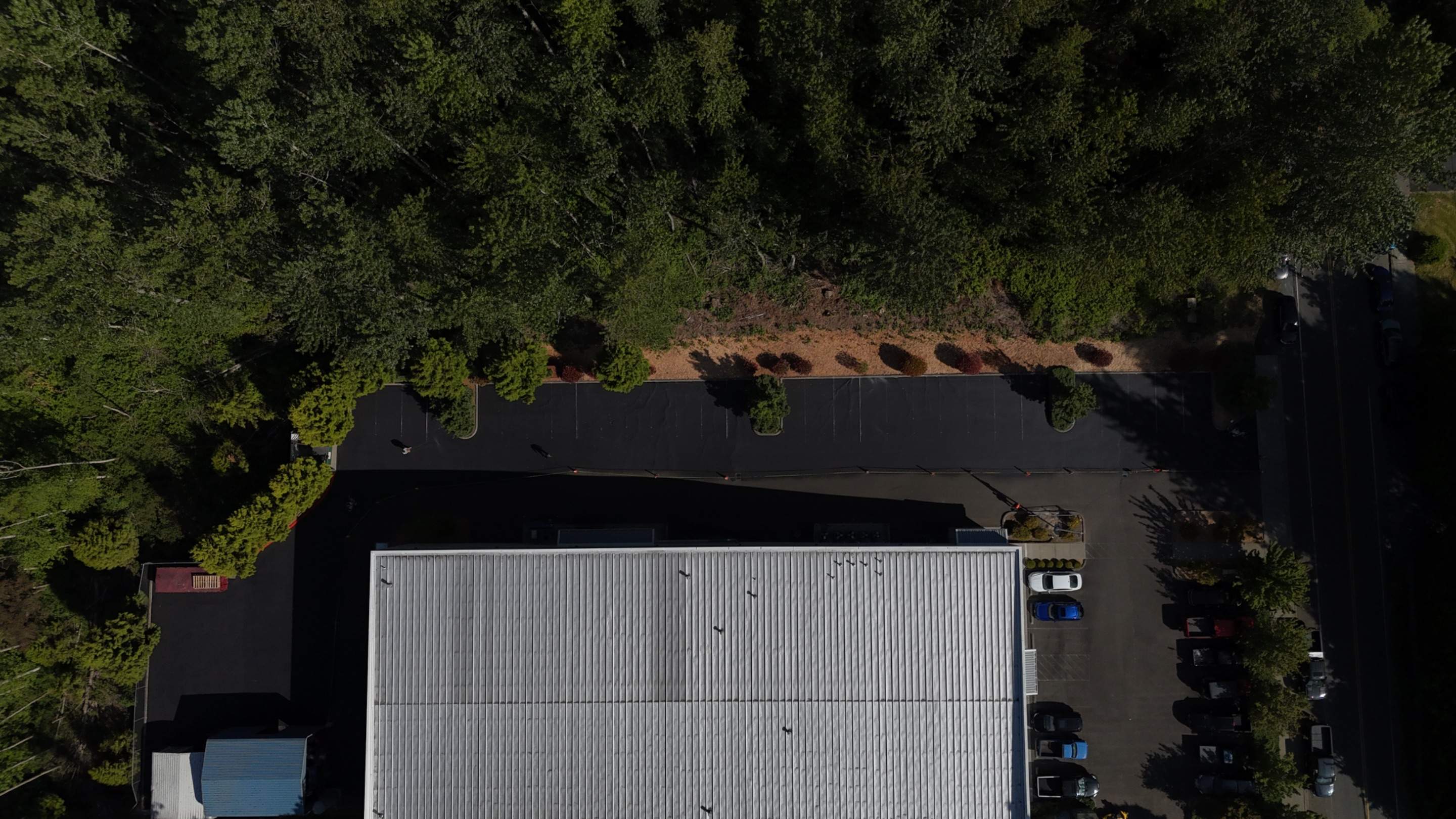 King Machine Business Parking Lot Sealcoat Overlay | Mukilteo by Jireh Asphalt & Concrete Inc 