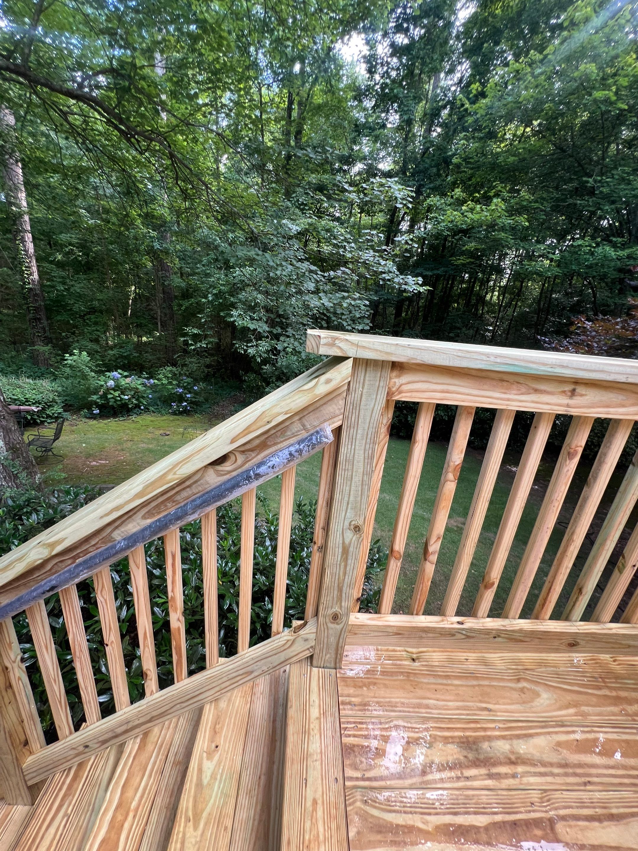 Pressure-Treated Wood Deck Replacement and Staircase Installation in Kennesaw by Swift Home Renovations