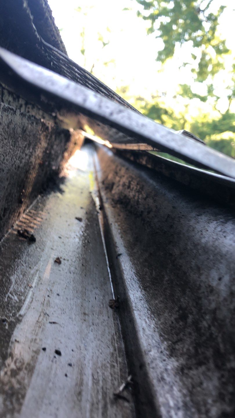 Gutter Cleaning by American Home Contractors