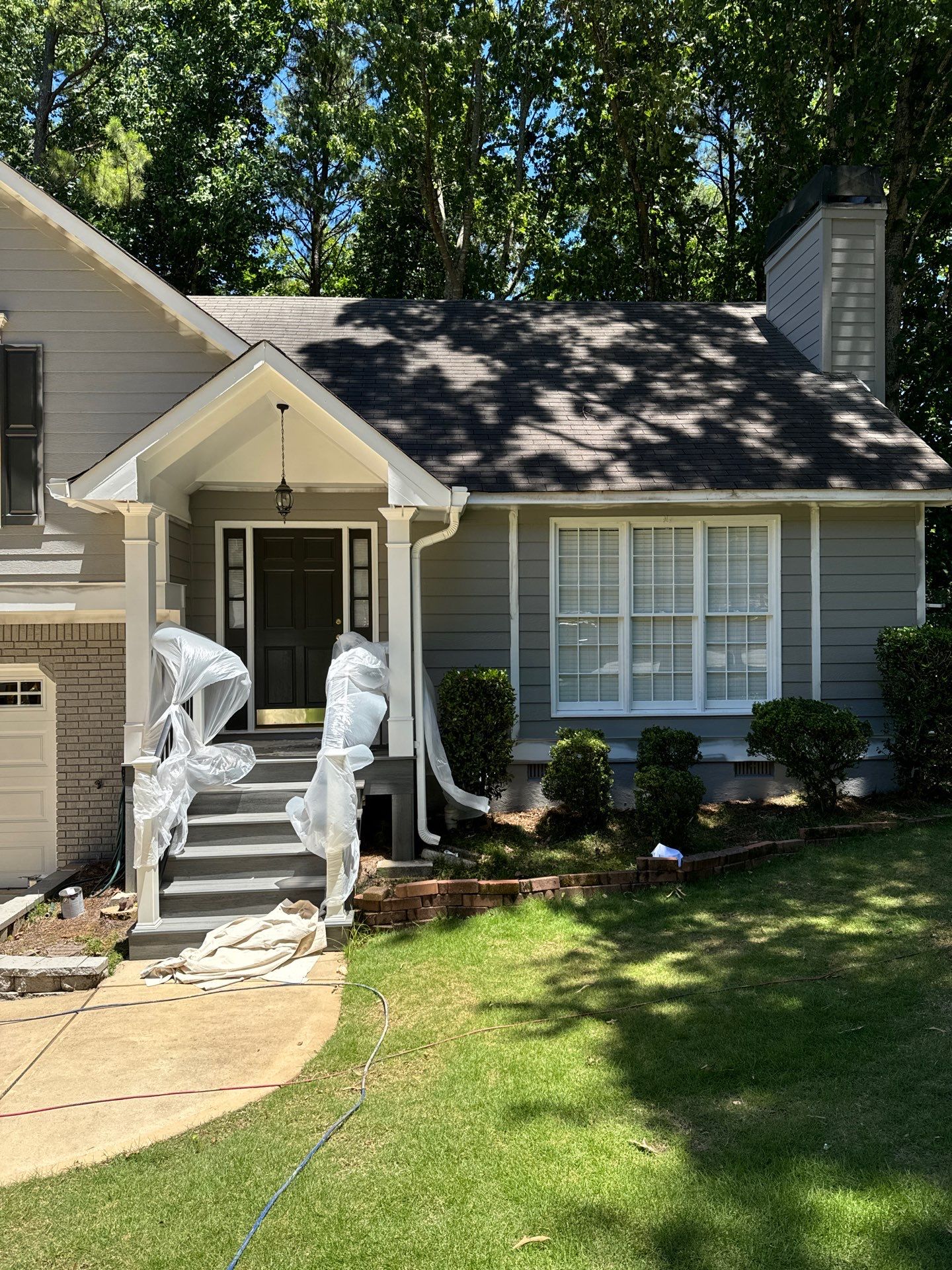 Exterior Painting and Chimney Siding Refresh in Woodstock, Georgia by Swift Home Renovations