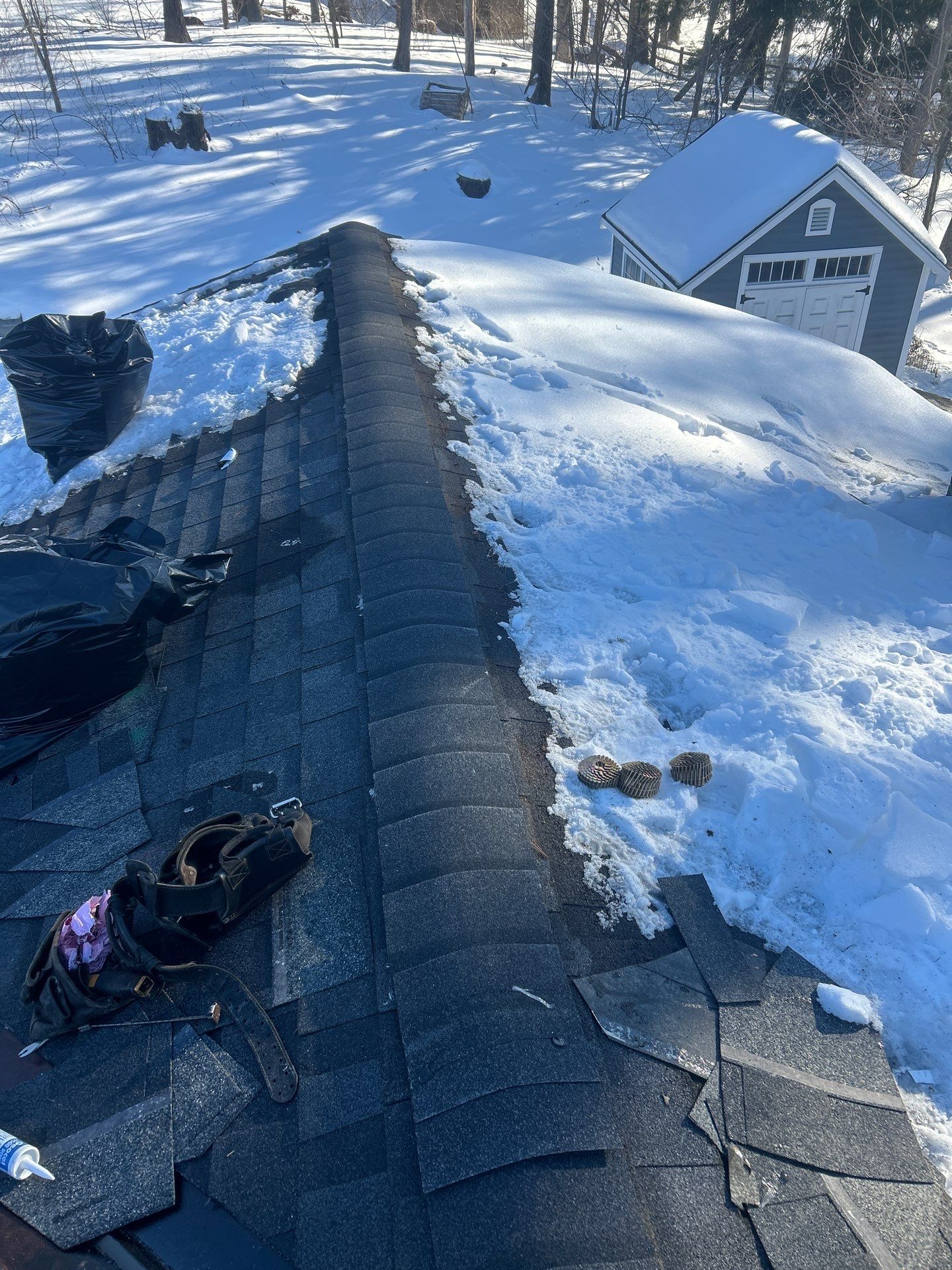 Ridge Cap Replacement & Black Metal Valley Installation in Chelmsford, MA by Mighty Dog Roofing of Greater Middlesex County