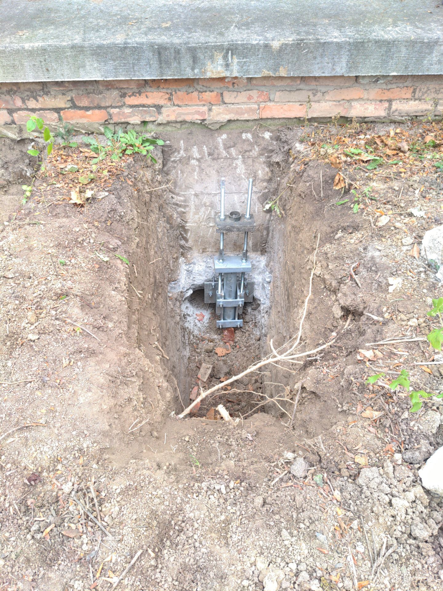 Helical Piers and Pillar Lift using Helical Foundation Footings by Toledo Basement Repair
