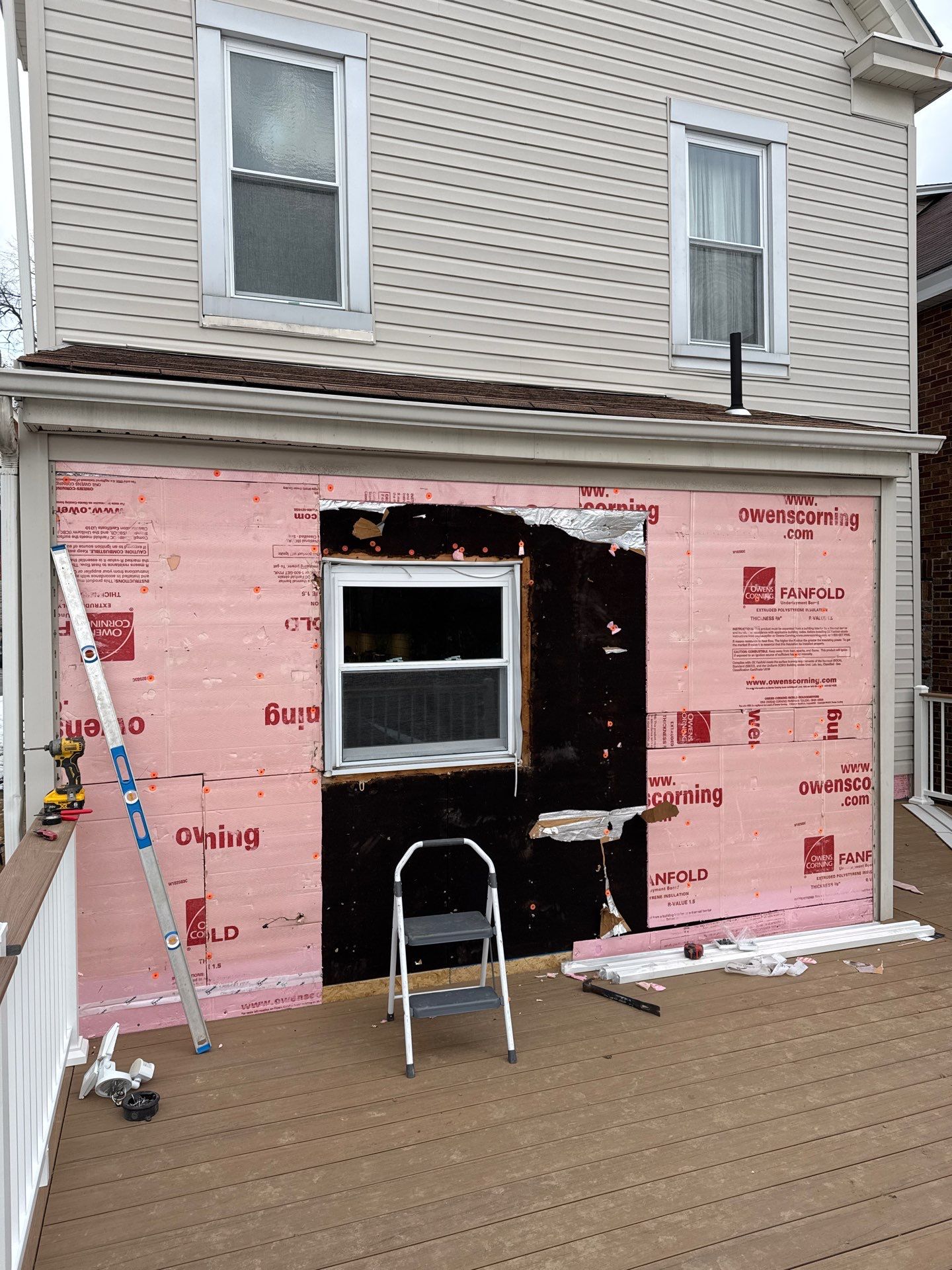 Deck and door by Cousins Roofing Siding & Decks