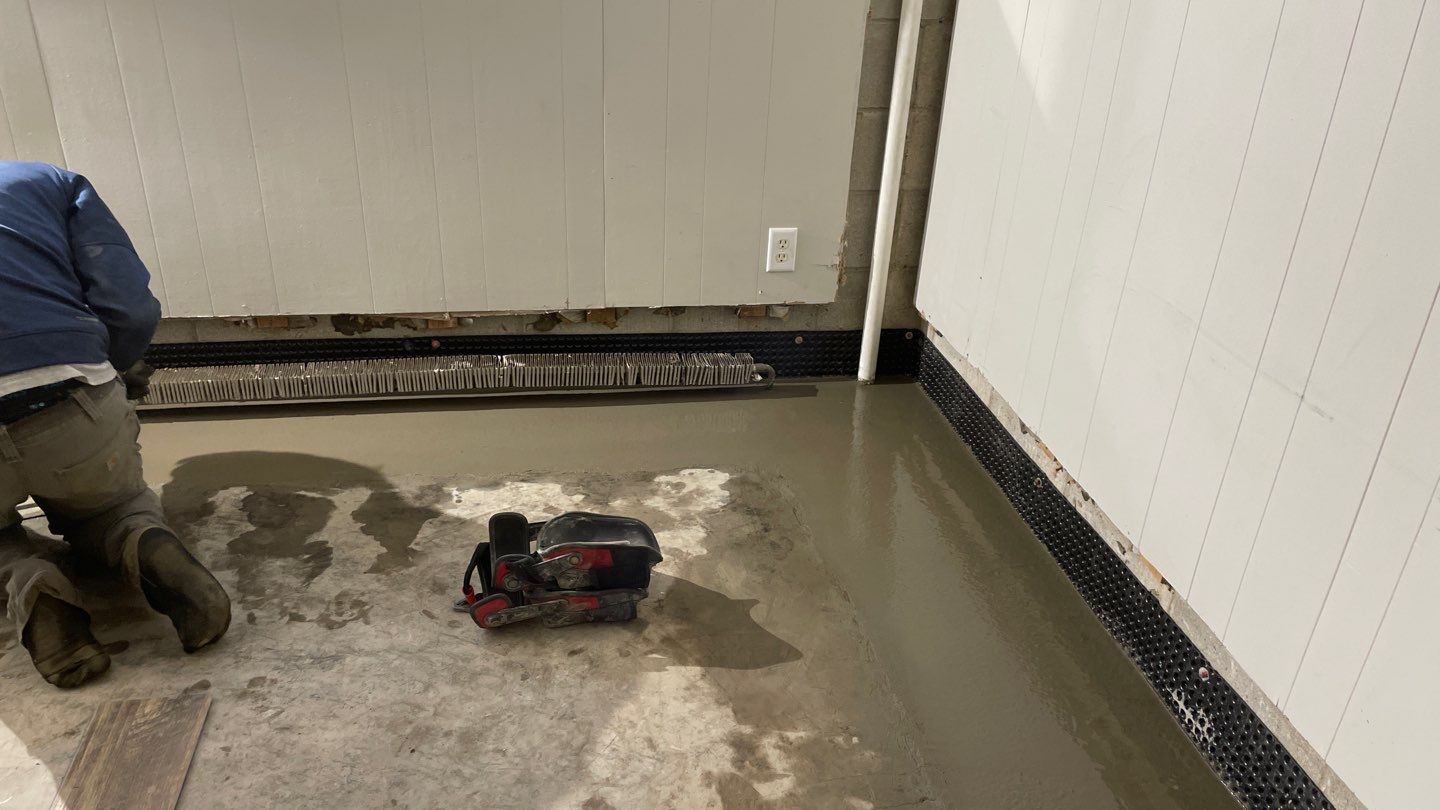 Drain tile and sump pump for George by Waterproofing Northeast