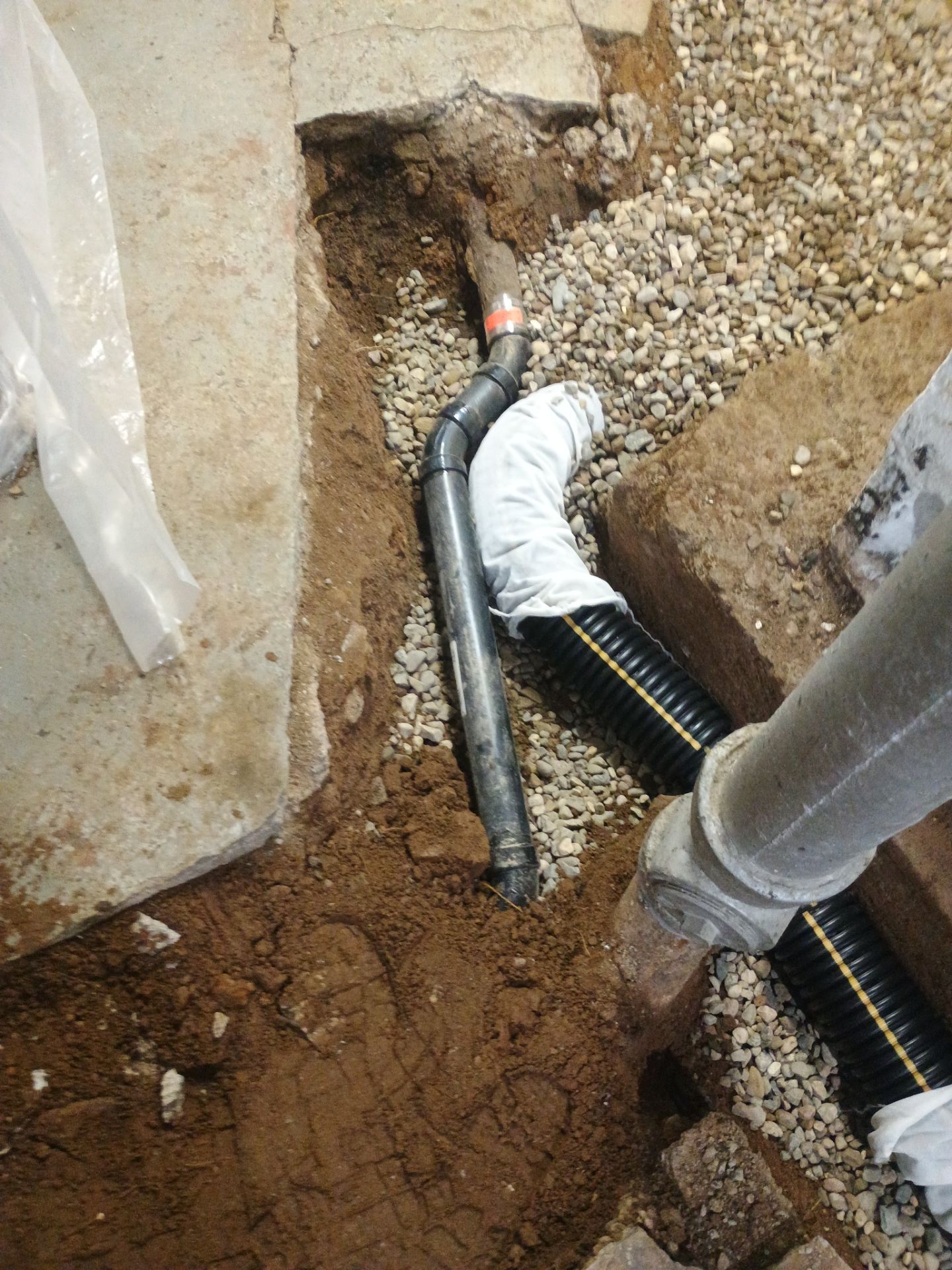 Interior Drain Tile & Yard French Drain in St. Paul, MN by Waterproofing Northeast