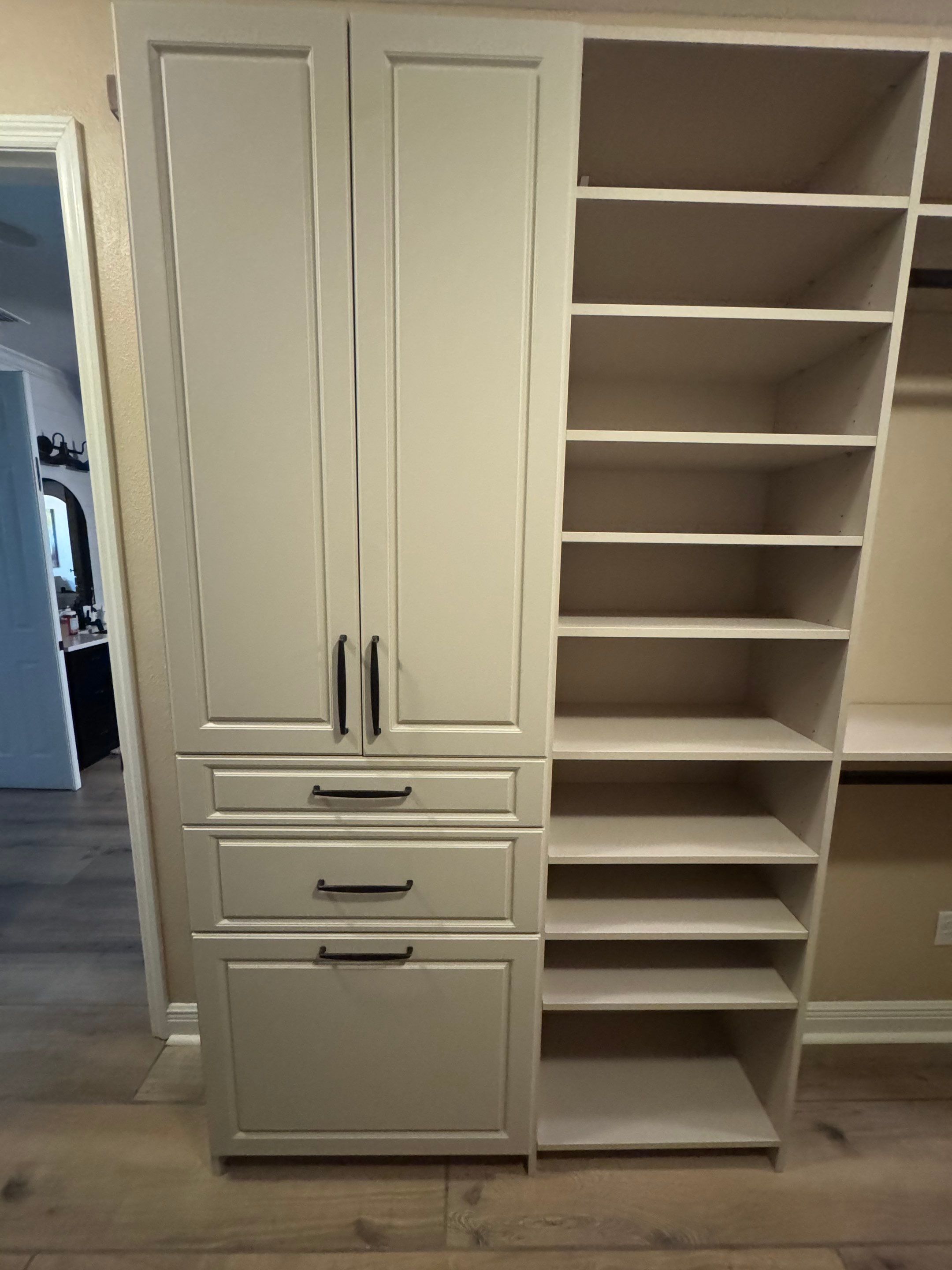 Custom Closet Storage Systems and Laminate Cabinetry Installation in Oldsmar by Square 1 Garage and Closet Solutions