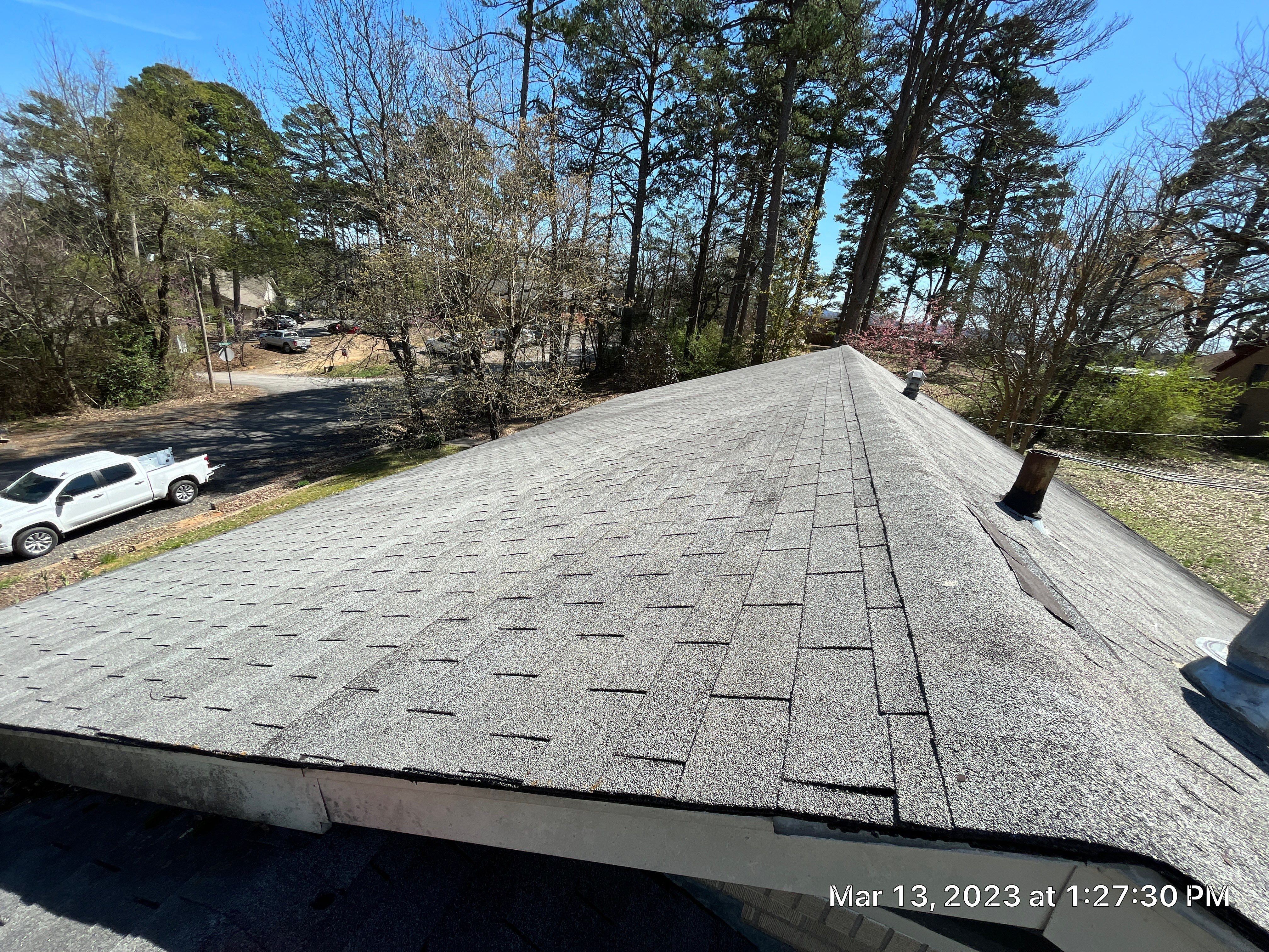 Residential Roofing Installation using 26 Gauge Colored Panels by Hostetler Roofing