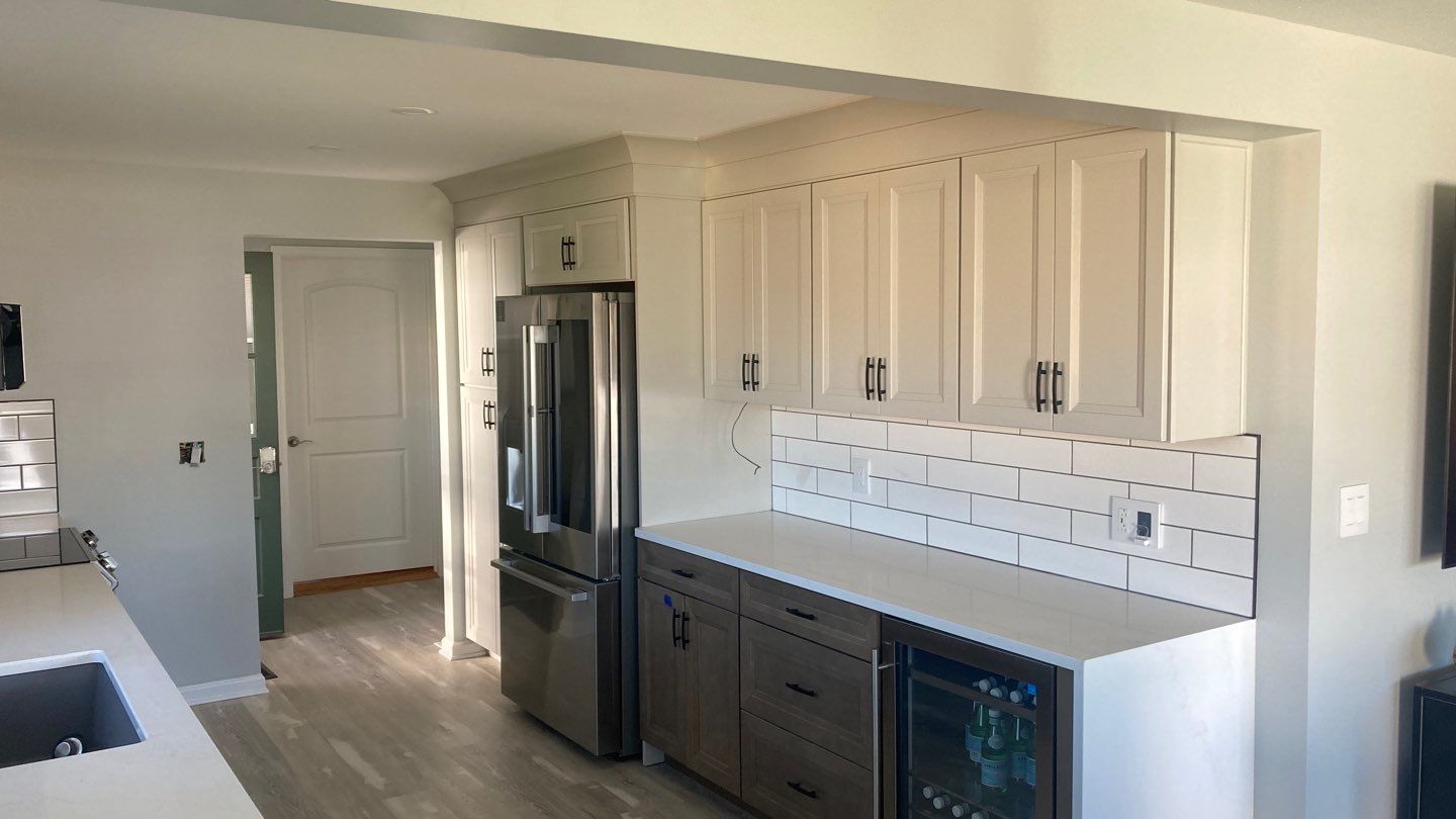 Interior Renovations, Kitchen Remodel, and Window Replacement by Ivy Lea Construction