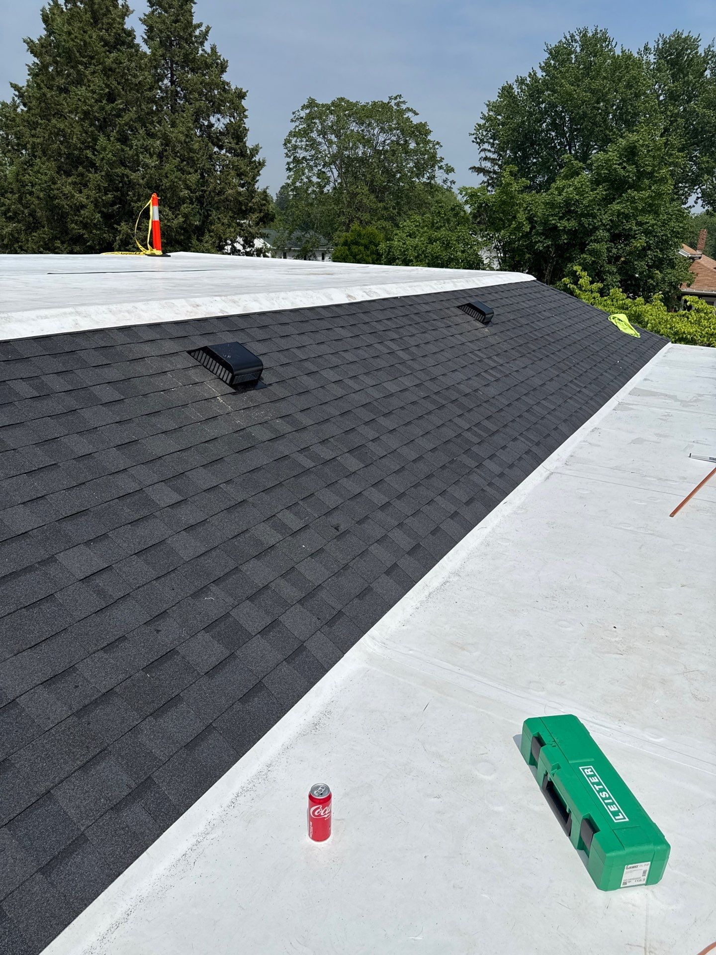 Commercial Flat and Shingled Roof Project by 42 North Construction, LLC.
