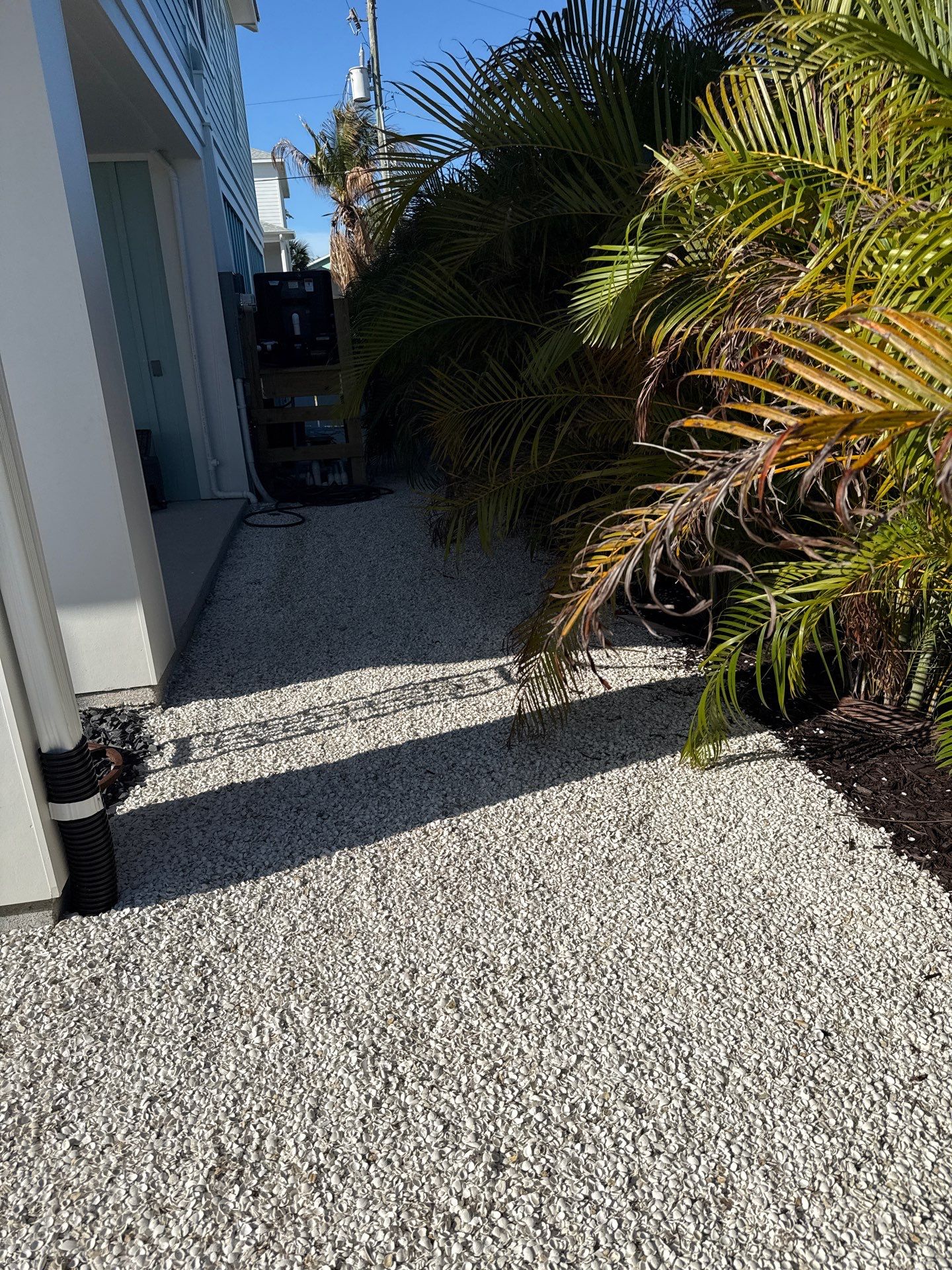 New White Seamless Gutters Installation and Downspouts, Reseal Gutters in Fort Myers Beach, FL  by Gutter Professors